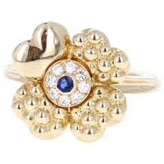 Fred 18 Karat Yellow Gold, Sapphire and Diamond Flower Ring