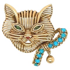 FRED, 18 Karat Yellow Gold, Turquoise and Green Tourmaline Cat Brooch