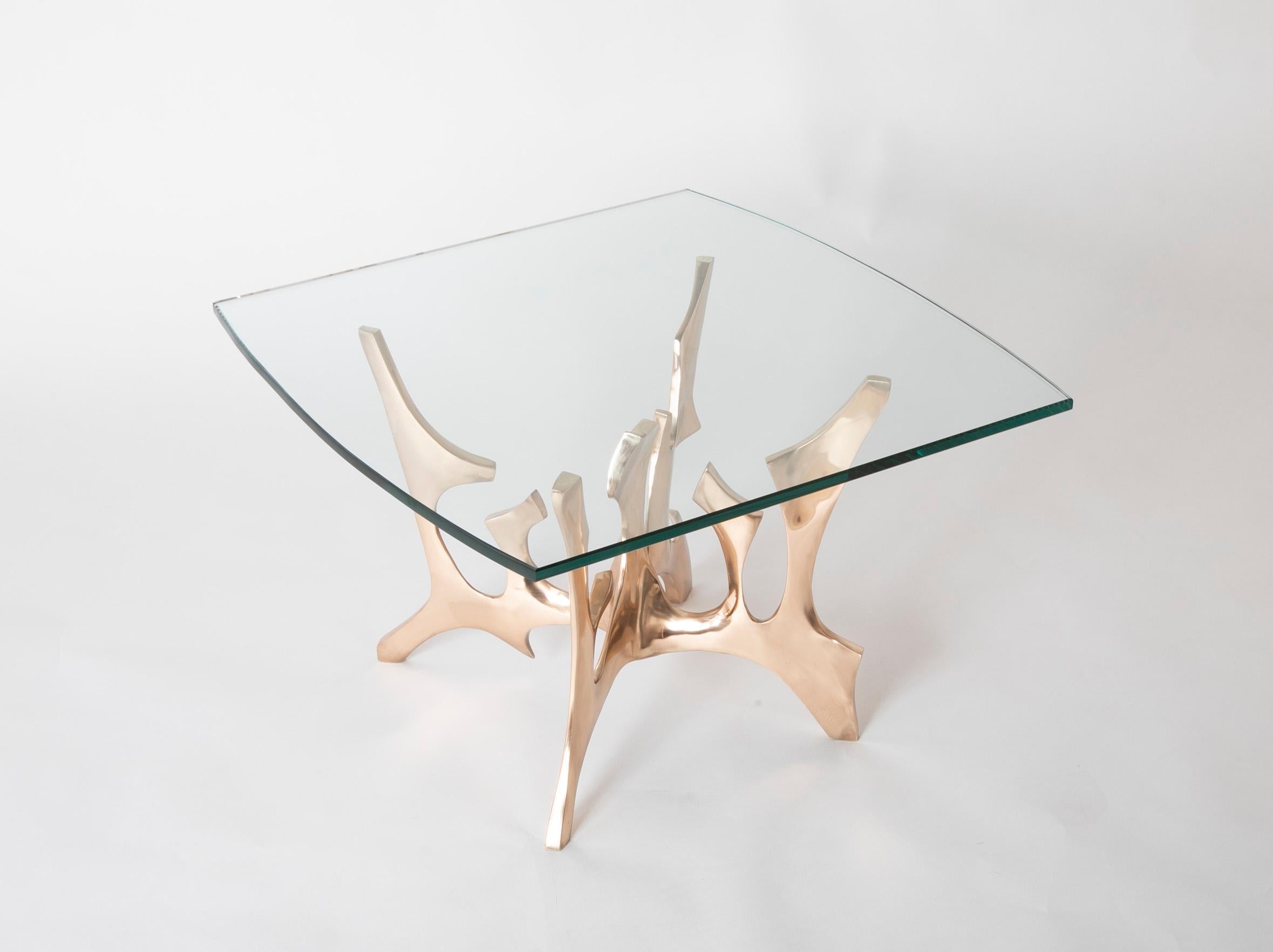 Fred Brouard ( French. 1944 - 1999 ) square glass topped low table with sculptural polished brass and bronze base. Signed and numbered 2/25.