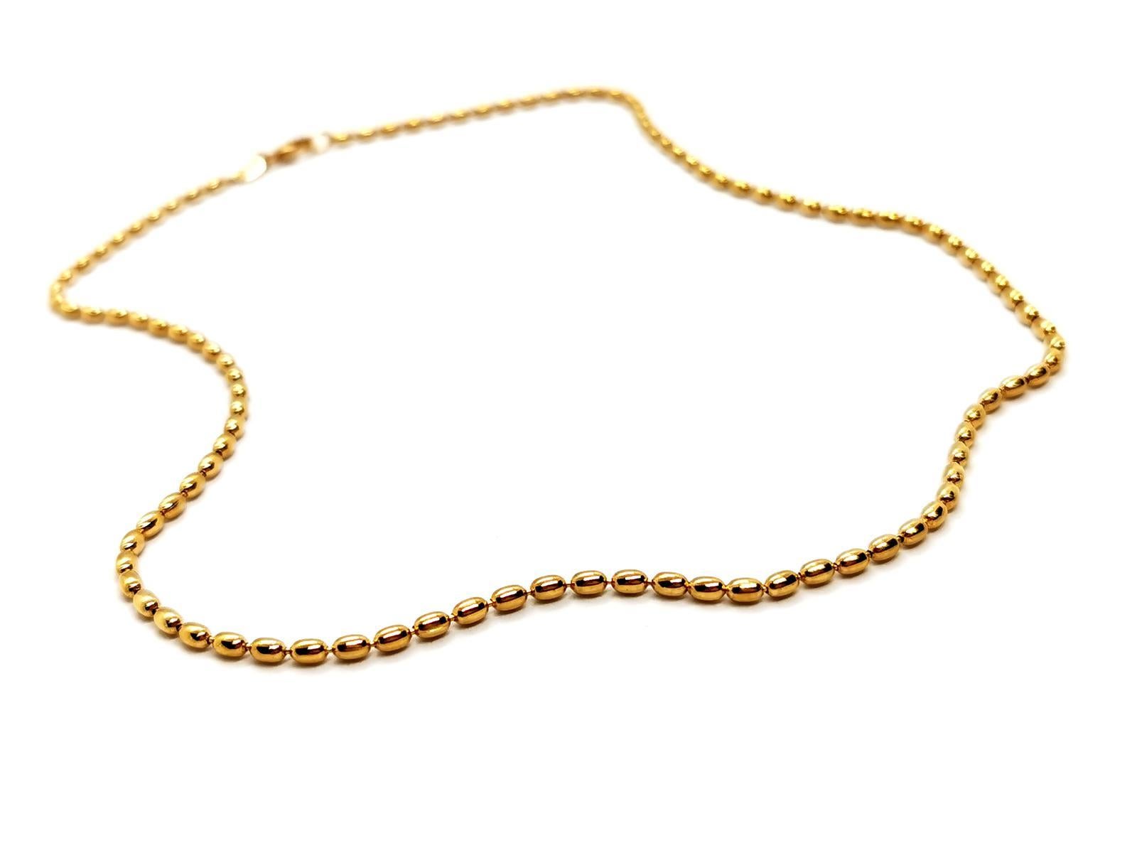 Necklace signed by Maison Fred. in 750 thousandths yellow gold (18 carats). olive link chain. length: 42 cm. width: 0.22 cm. dimensions of a link: 0.3 cm x 0.22 cm. weight total: 10.71 g. owl hallmark. excellent condition
