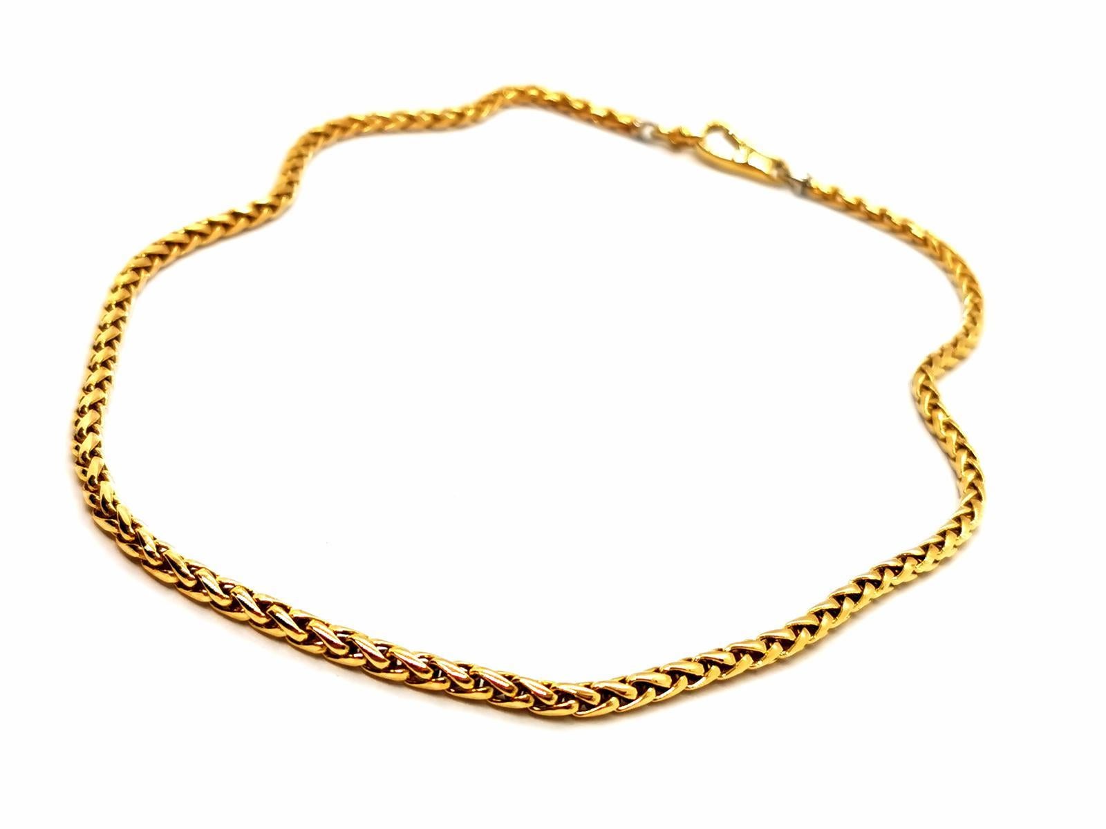 Fred house necklace in yellow gold 750 thousandths (18 carats). palm mesh. length: 41 cm. width: 0.28 cm. total weight: 32.2 g. eagle head hallmark. excellent condition

