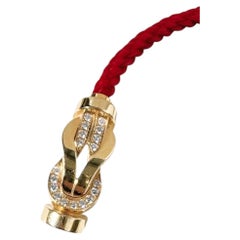 Pulsera Fred Chance Infinie de 8 eslabones en oro amarillo de 18 quilates con medio pavé de diamantes