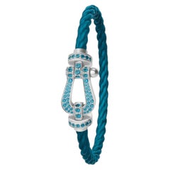 FRED Force 10 Armband aus 18-karätigem Weißgold in Hufeisenform, mit Diamanten und Saphiren im Pavé-Setting