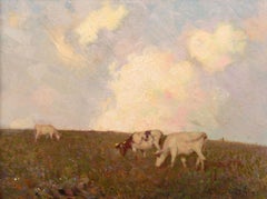 Cows grazing on a hillside