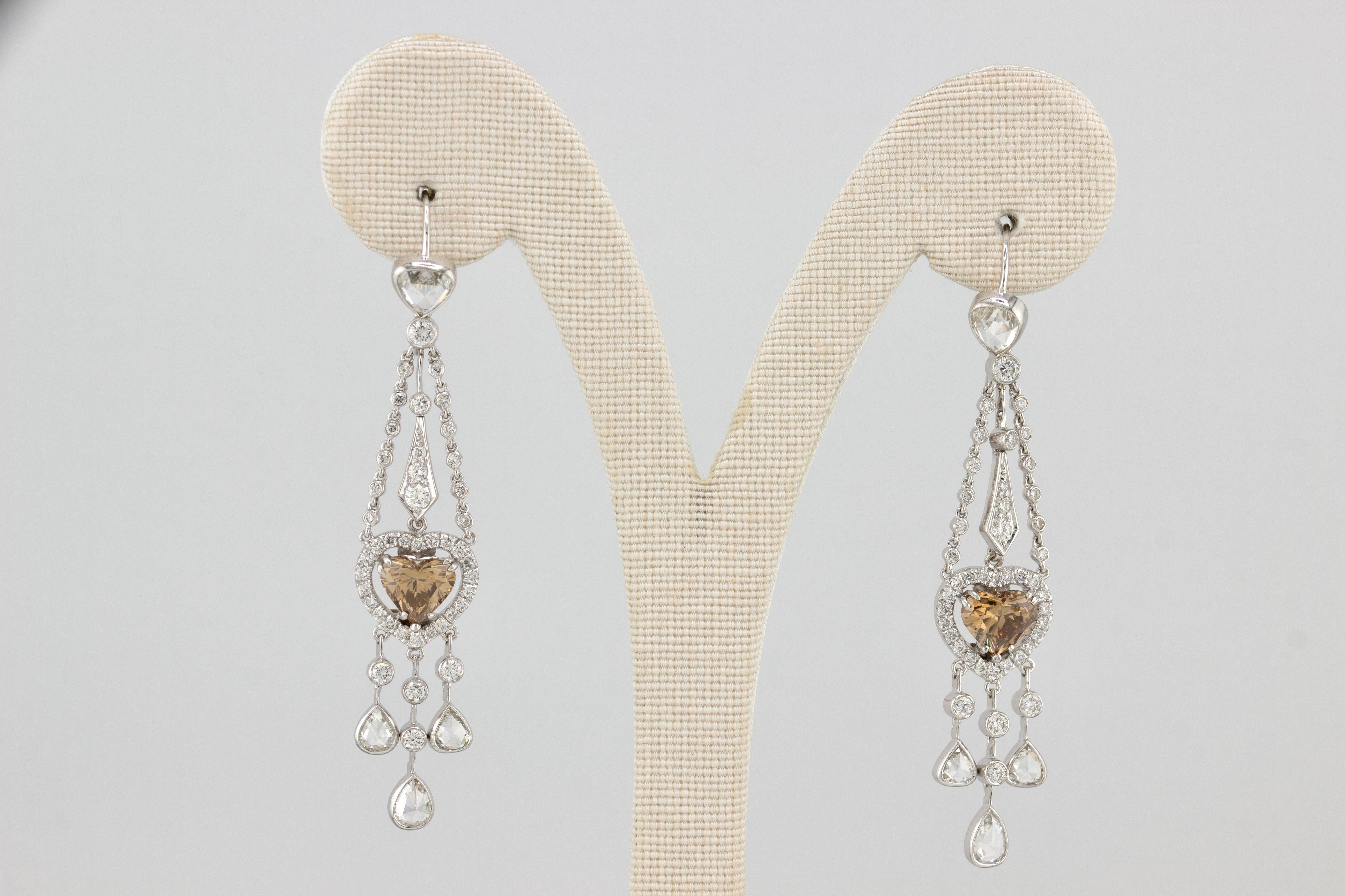 Fred Leighton Earrings
18K White Gold
2 Champagne Diamonds: 2.32cts
Diamonds on the side: approx 2.5ctw
SKU: ECJ01669
