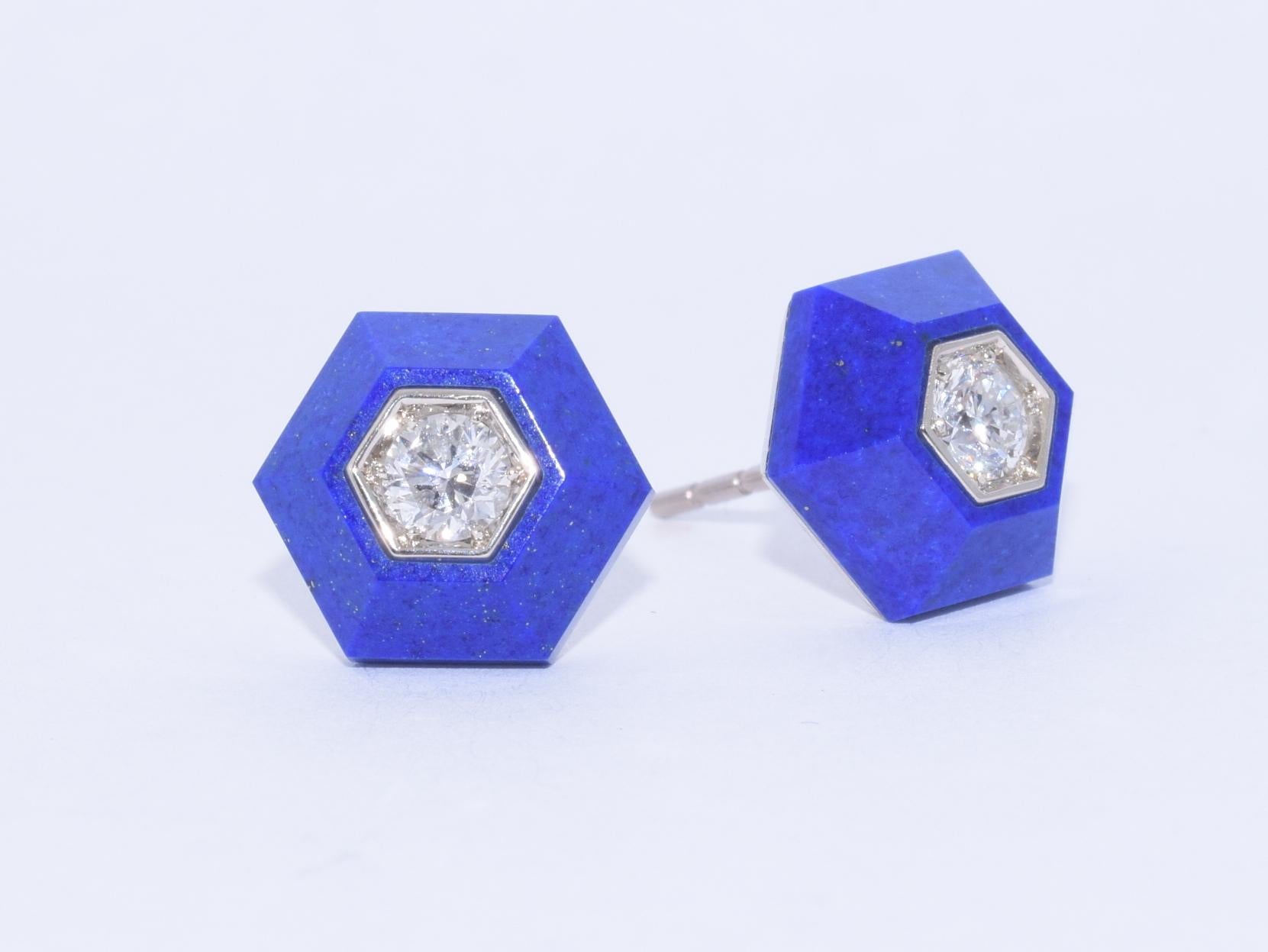 Each designed as an hexagonal lapis lazuli stud set with a central round brilliant diamond, weighing a total of 0.36 carats, signed Fred Leighton. The earrings measure approximately 11 x 9.6mm. 

Fred Leighton is renowned for their extraordinary
