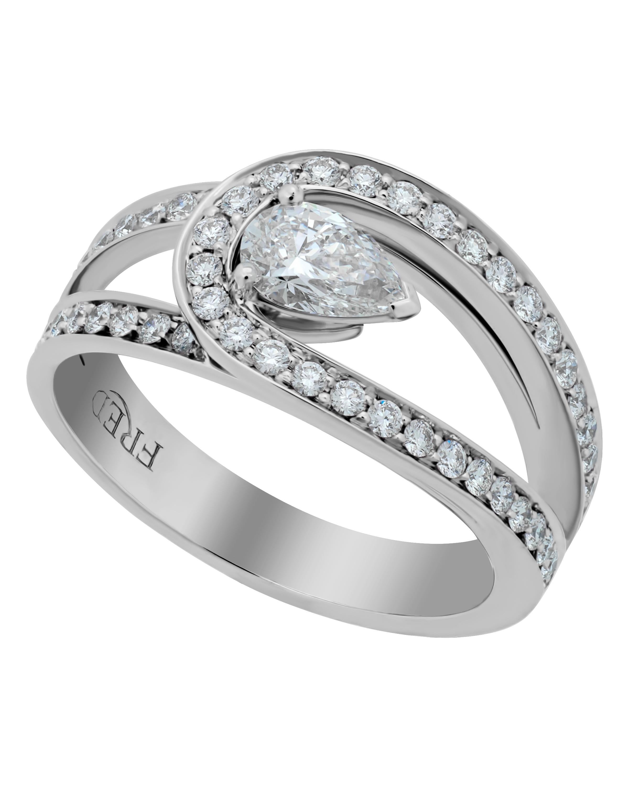FRED Lovelight platinum Ring features 0.32ct. F-VVS1 pear cut diamond center with color and clarity: F, VVS1 shimmering with 0.55ct. tw. pavé diamonds. The ring size is 5.75 (51.3). The weight is 8.5g.
