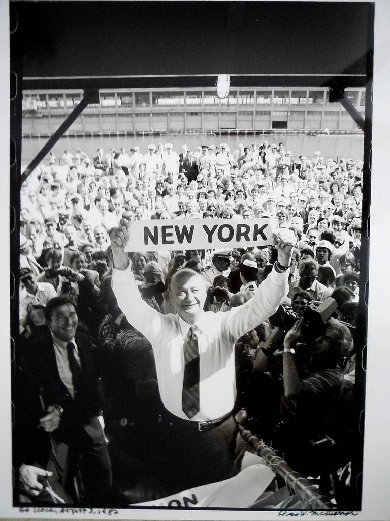 Ed Koch at the waterfront greeting a passenger ship.