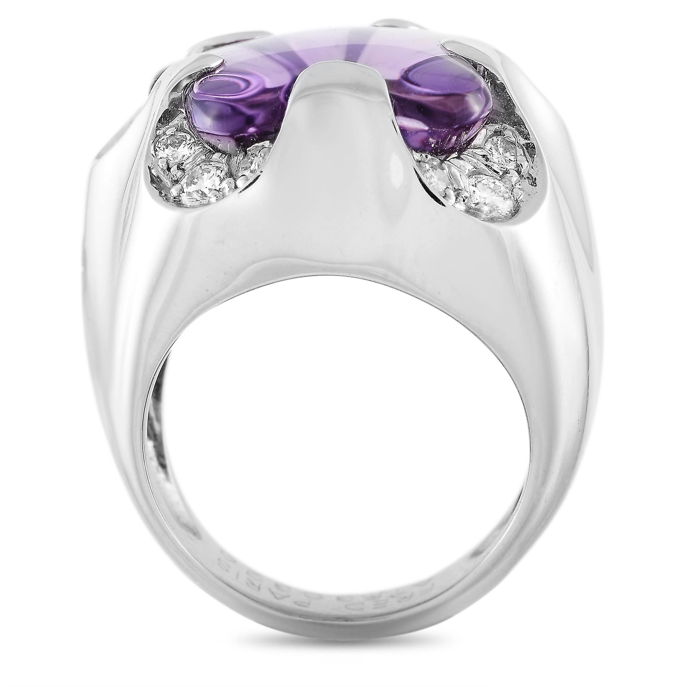 This Fred of Paris cocktail ring is crafted from 18K white gold and weighs 15.9 grams. It boasts band thickness of 13 mm and top height of 9 mm, while top dimensions measure 21 by 21 mm. The ring is set with an amethyst and a total of 0.35 carats of