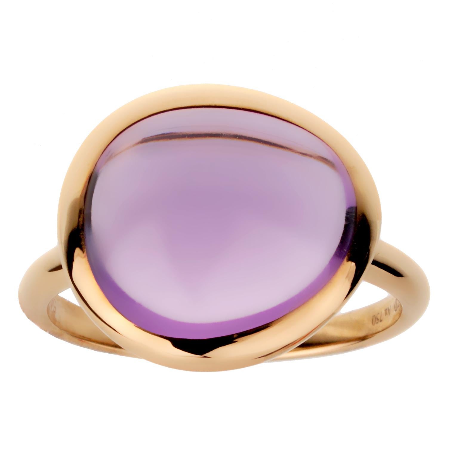 A chic Fred of Paris rose gold cocktail ring showcasing a 7ct cabochon Amethyst set in 18k gold. The ring measures a size 5 3/4 and can be resized if needed.