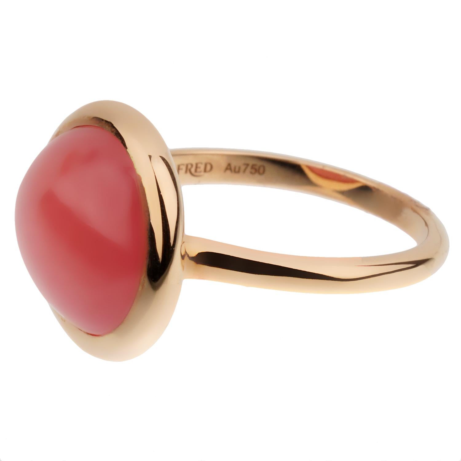 A chic Fred of Paris rose gold cocktail ring showcasing a 7ct cabochon Rhodochrosite set in 18k gold. The ring measures a size 5 3/4 and can be resized if needed.