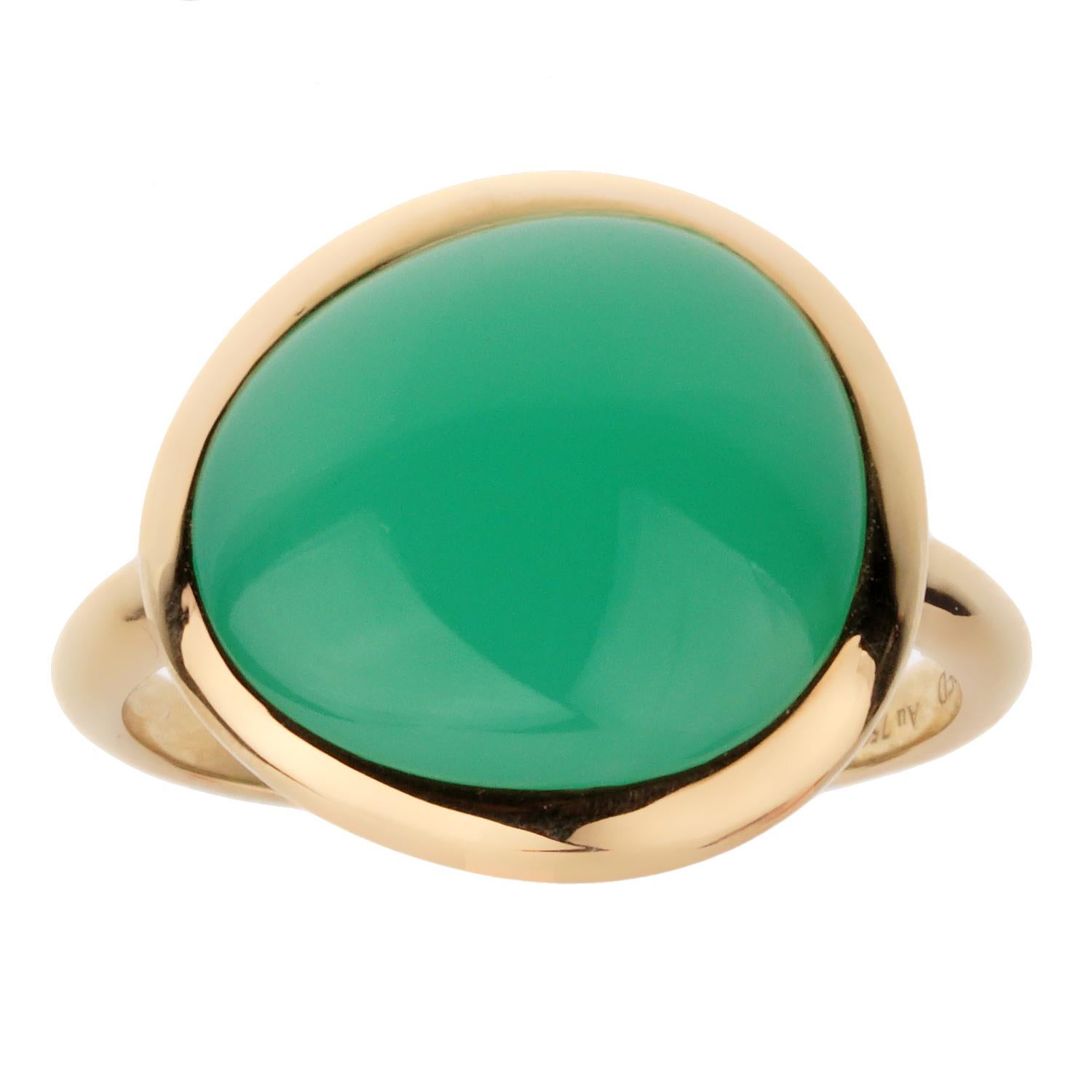 A chic Fred of Paris yellow gold cocktail ring showcasing a 7ct cabochon Chrysophase set in 18k gold. The ring measures a size 7 1/2 and can be resized if needed.