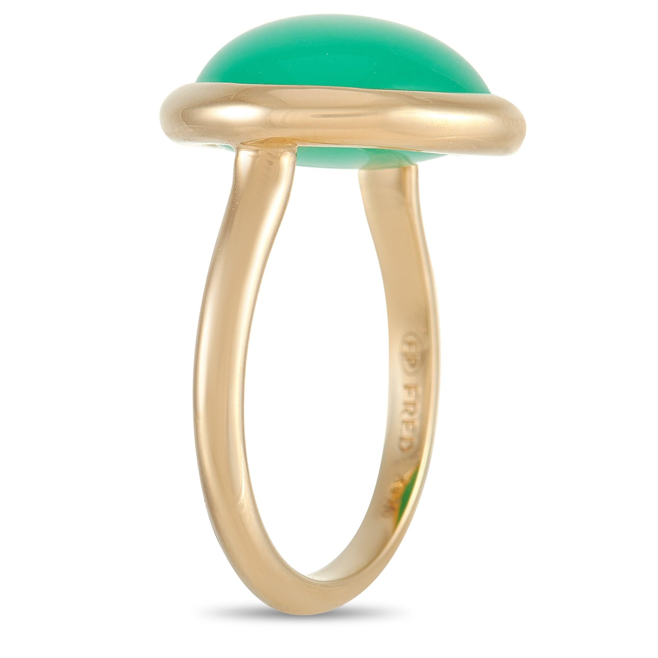 There’s something captivating about this Fred of Paris Belle Rives ring, which pairs opulent 18K Yellow Gold with a striking green Chrysoprase gemstone. This ring’s minimalist design provides the perfect backdrop for its delightfully uncommon center