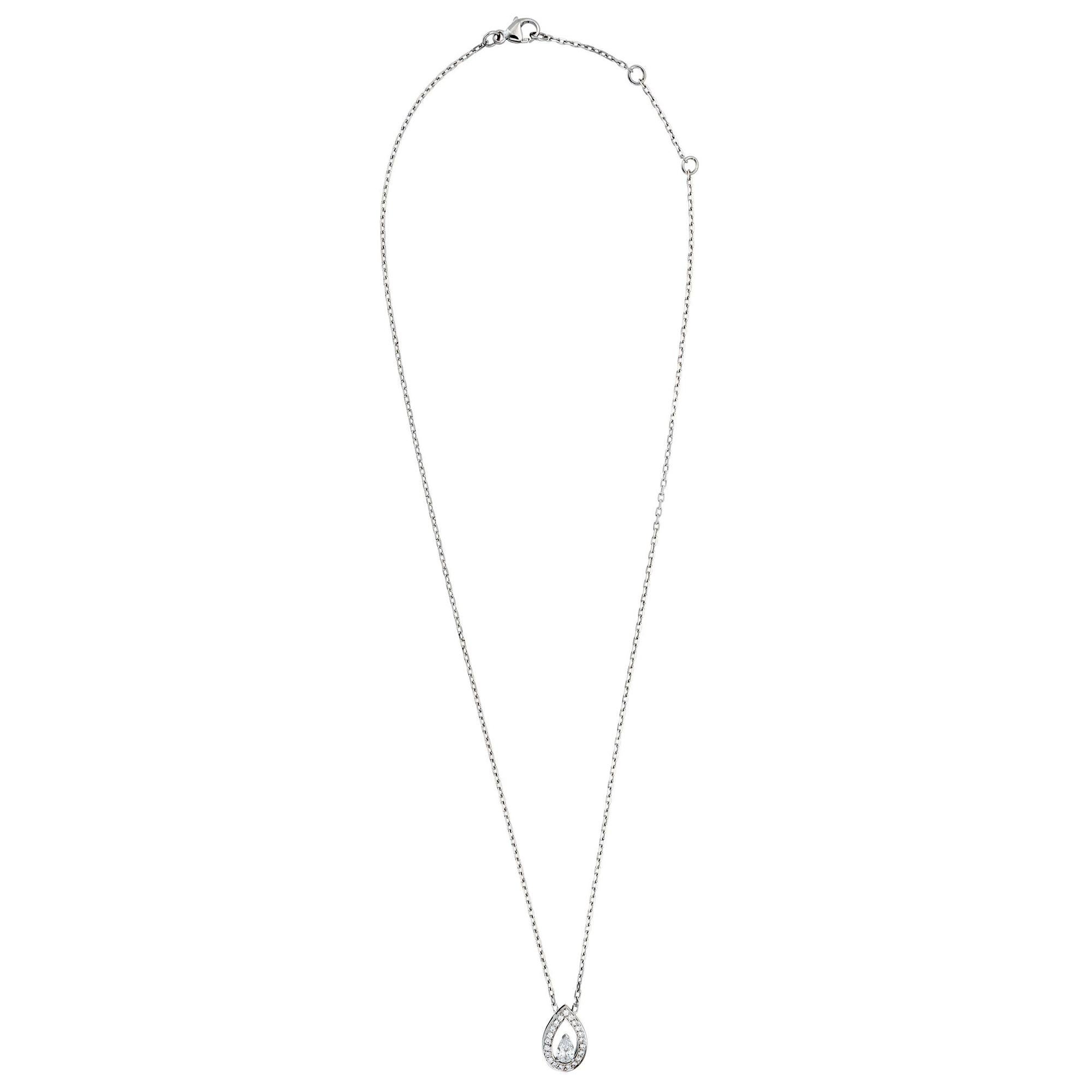 A chic timeless Fred Of Paris diamond necklace showcasing a GIA certified .53ct Vs2 clarity, E color diamond wrapped with an additional .25ct of round brilliant cut diamonds in shimmering 18k white gold. The necklace measures 16 inches in length and