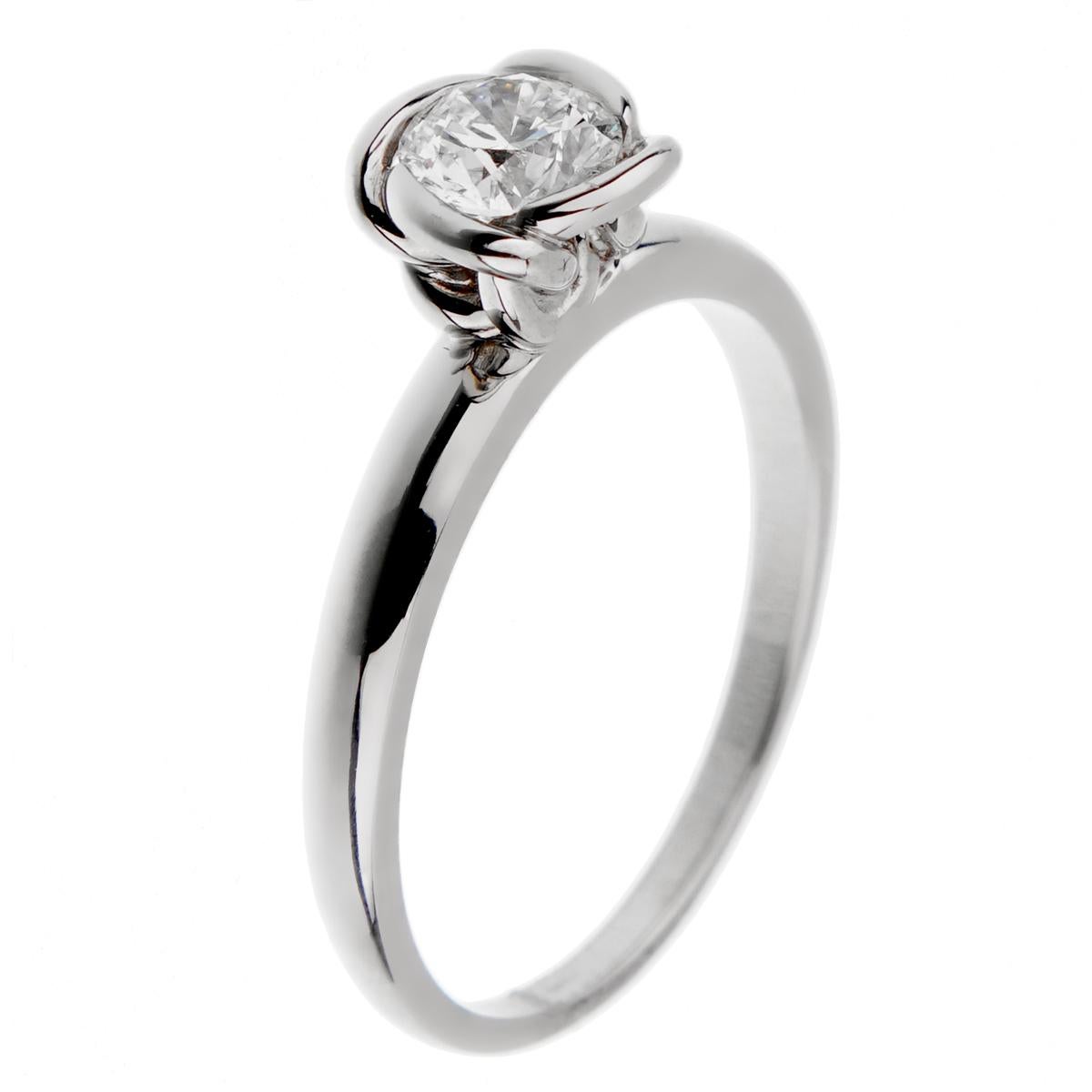 A chic Fred of Paris diamond engagement ring from the Fleur Celeste collection showcasing a .51ct GIA certified solitaire D color Vvs1 clarity wrapped in platinum. The ring measures a size 5 3/4 and can be resized.

Retail: $8650
Sku: 2796
