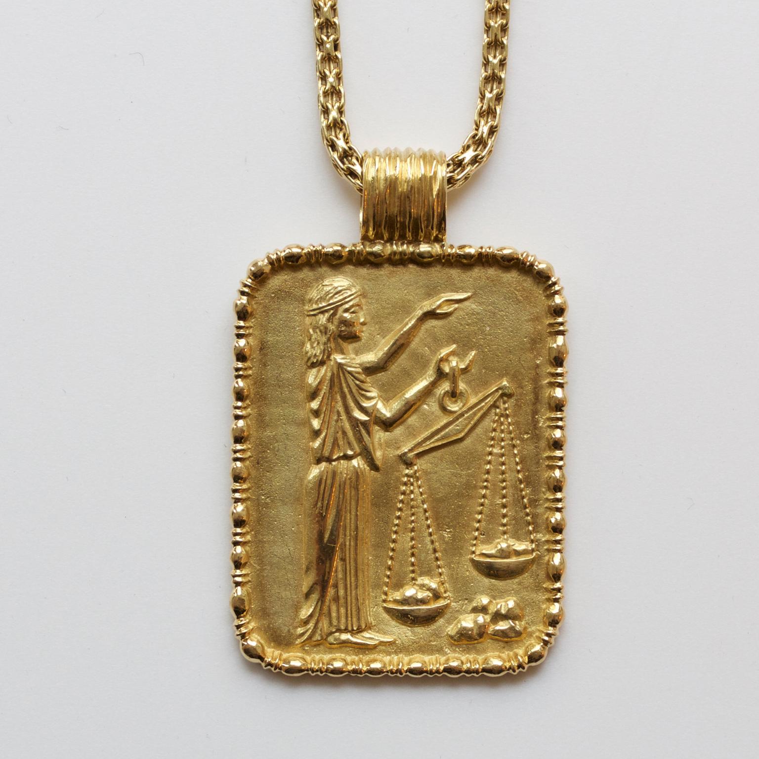 A yellow gold libra pendant, signed: Fred of Paris, circa 1970.

weight: 25.32 gram
dimensions: 4.1 x 3.3 cm
dimensions with hoop: 5 x 3.3 cm

the chain can be added for 2600 eur, the weight of the chain is 40 grams and the length is 91 cm