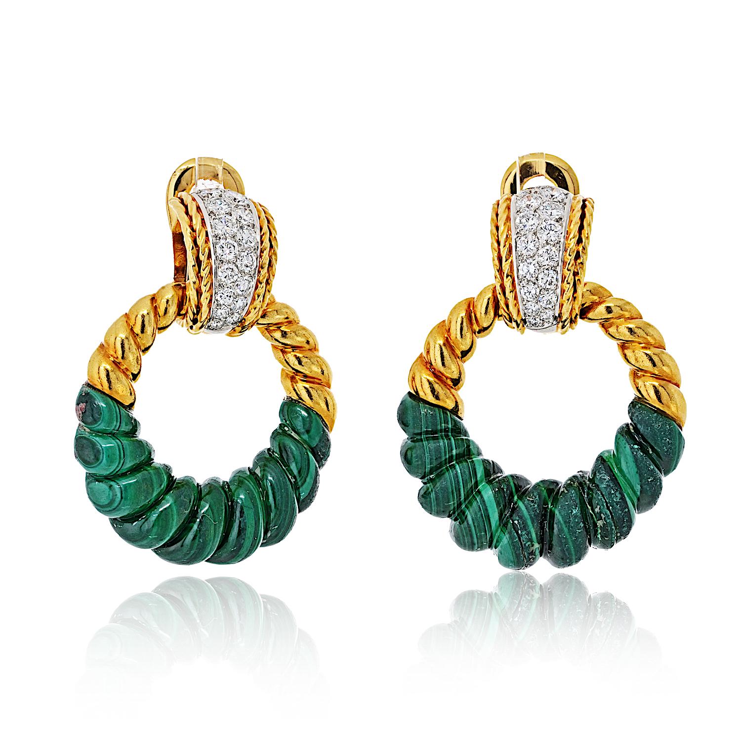 
These exquisite vintage earrings by Fred of Paris showcase the bold, elegant spirit of 1960s–70s French jewelry design. Crafted in 18K yellow gold, the earrings feature a diamond-set huggie top that can be worn three ways: solo for a refined