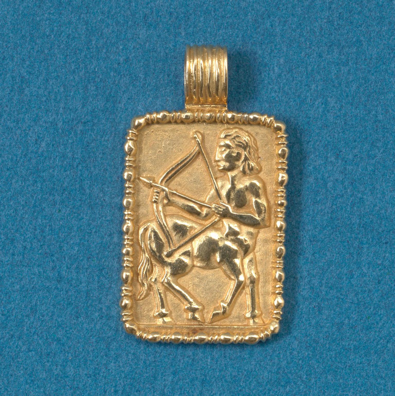 An 18 carat gold zodiac Sagittarius pendant by Fred of Paris, circa 1970.

weight: 15 grams
size without bail: 3.1 x 2.2 cm