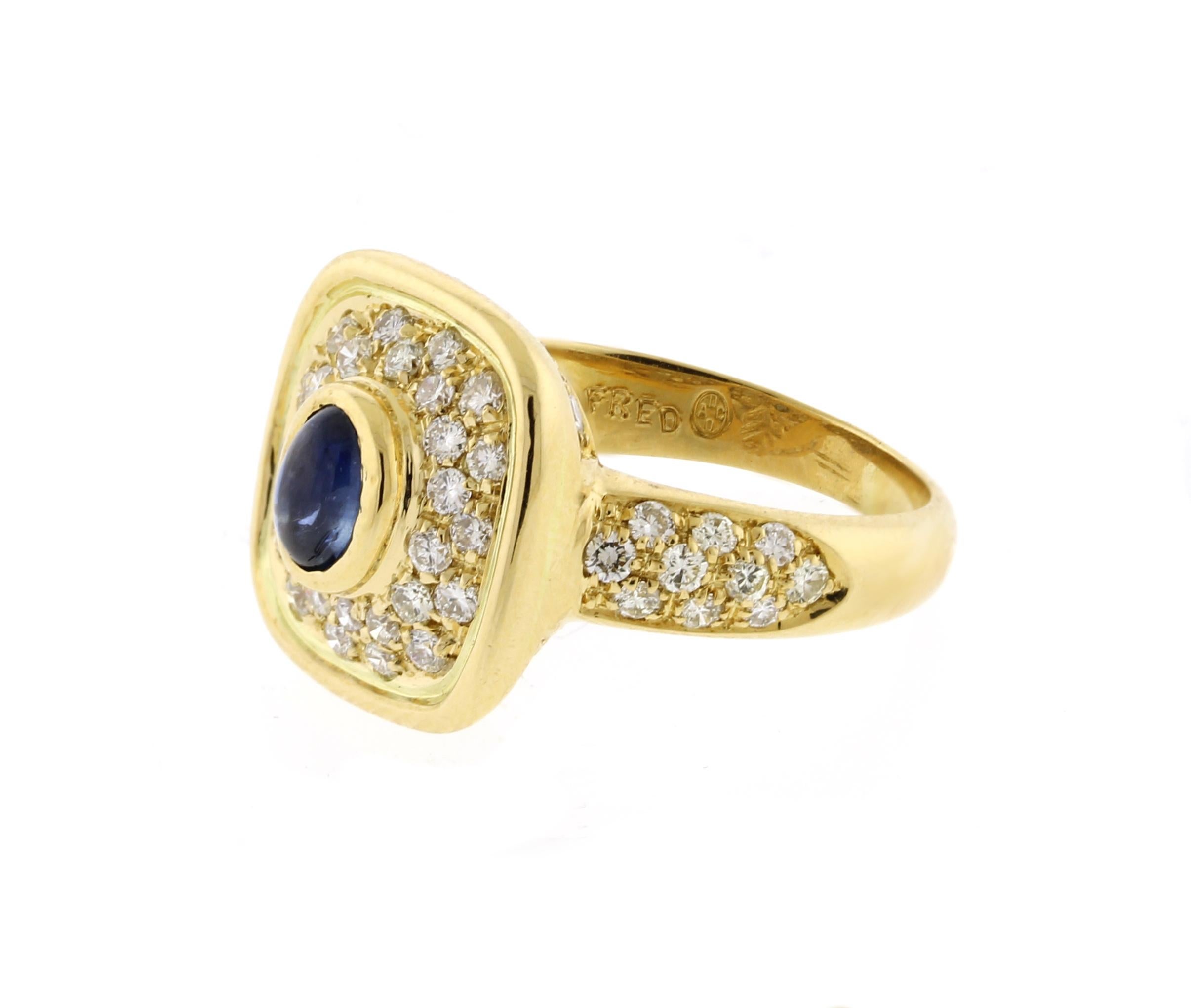 From Fred of Paris, a cabochon sapphire and diamond gold ring.
• Designer: Fred of Paris
• Metal: 18 karat yellow gold
• Circa:  late 20th century
• Size: 6 1/2 can be resized
• Diamond: 60 pave diamonds 1.55 carats
• Gemstone: Cabochon sapphire 1