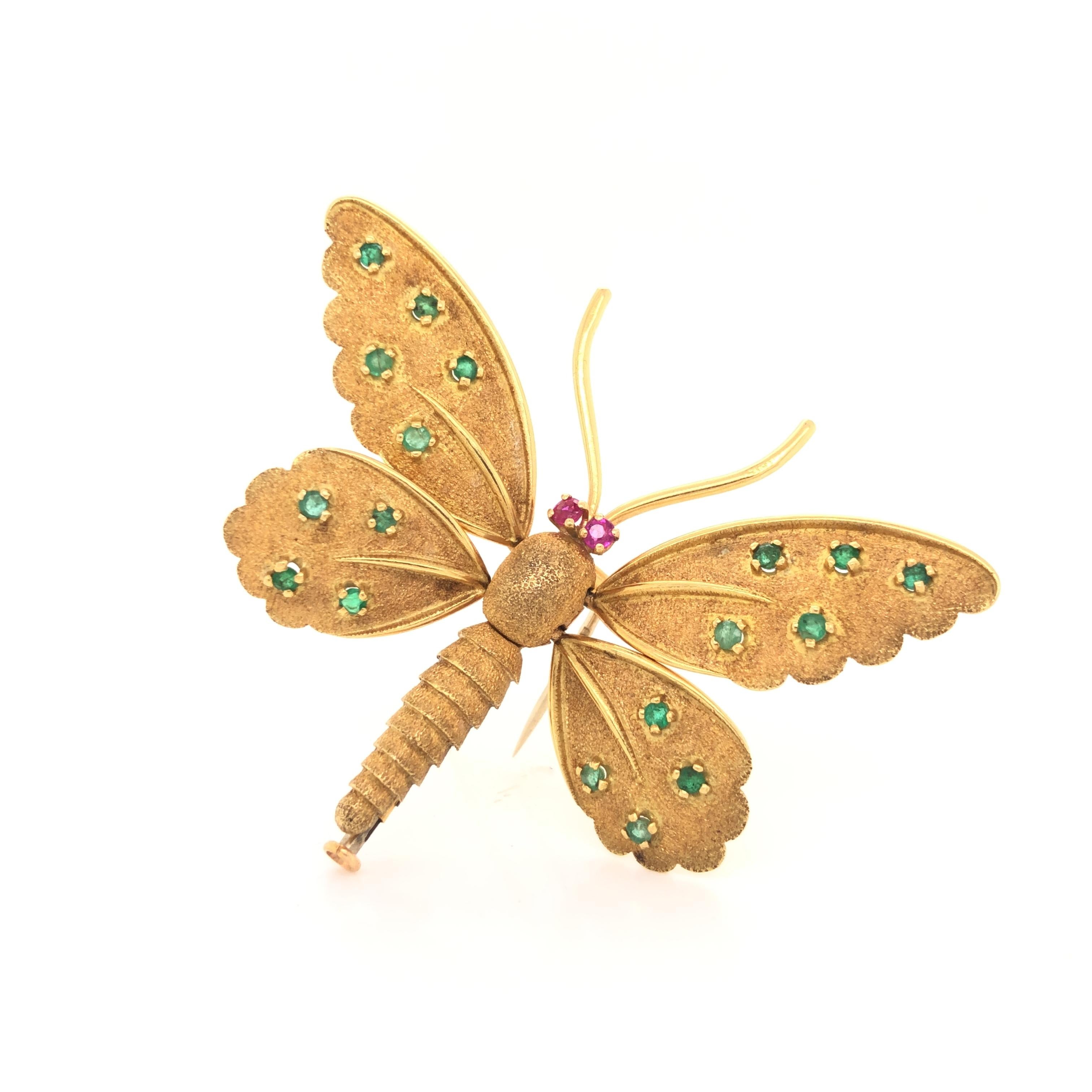 Gorgeous design on this amazing brooch from Fred Paris. The brooch is crafted in 18k yellow gold with a intricately textured design. The brooch wings are fully articulated as they show complete movement like an actual butterfly. You can adjust them