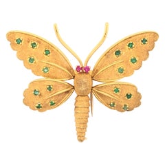 Fred Paris Schmetterlingsbrosche, 18 Karat, Smaragd & Rubin, gegliedert