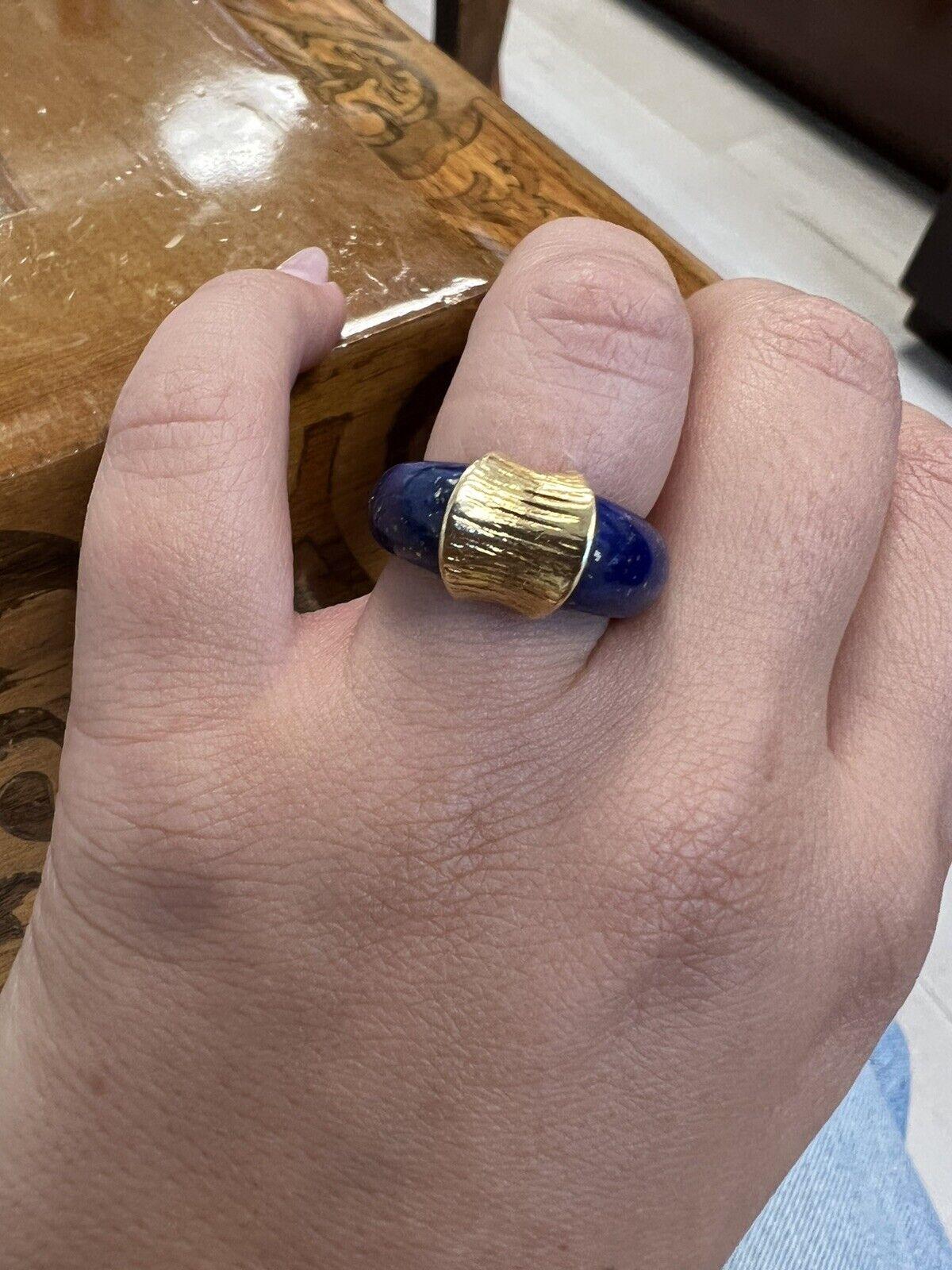 Fred Paris 18k Yellow Gold & Lapis Ring Vintage

Here is your chance to purchase a beautiful and highly collectible designer ring.  Truly a great piece at a great price! 

The weight is 9.4 grams.  The width is 10.9-4.4 mm.  The ring size is 6.5. 