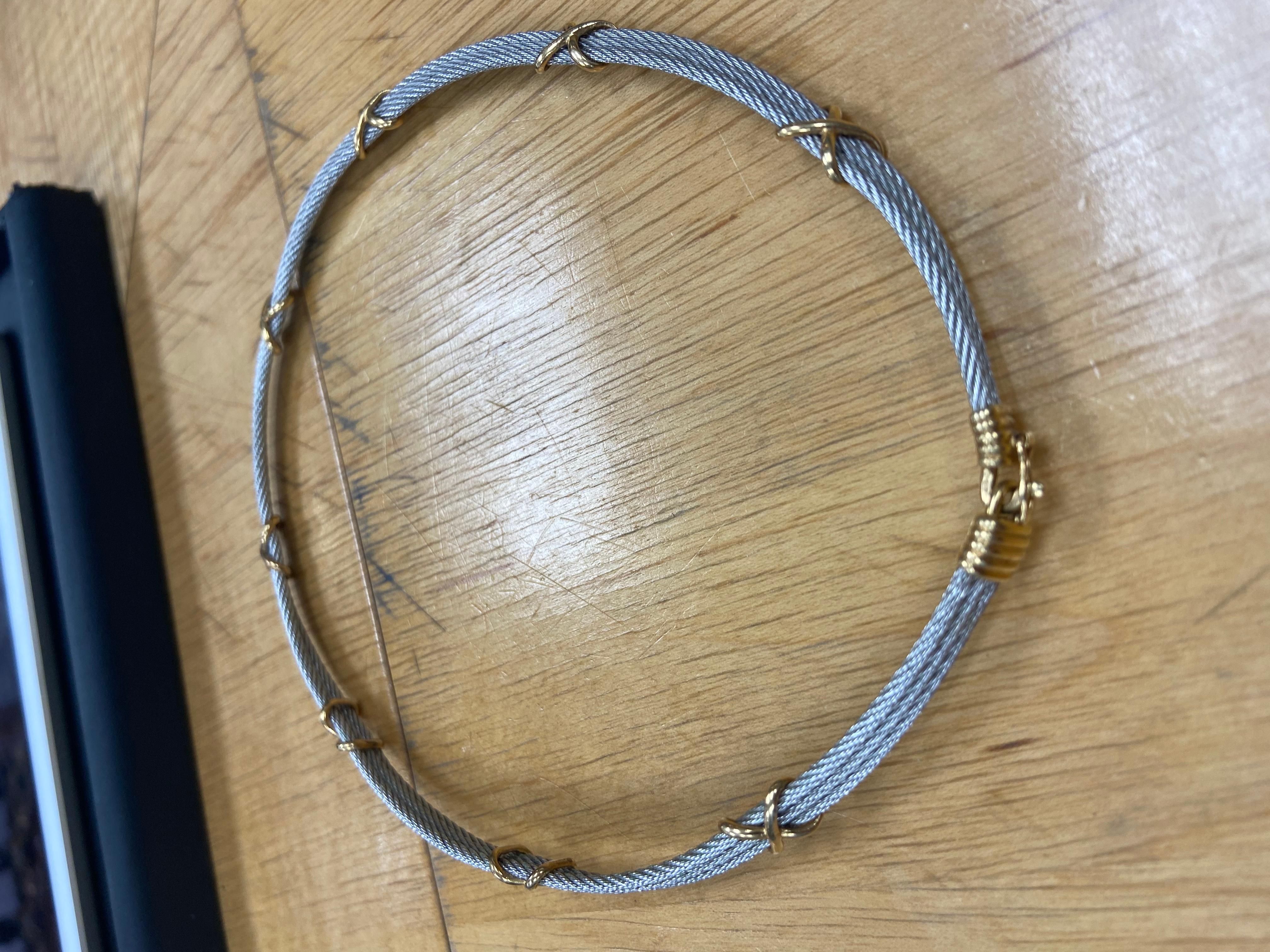Fred Paris 18k Yellow Gold & Stainless Steel Force 10 Choker Necklace Vintage

Here is your chance to purchase a beautiful and highly collectible designer necklace.  Truly a great piece at a great price! 

The weight is 28 grams.  The length is