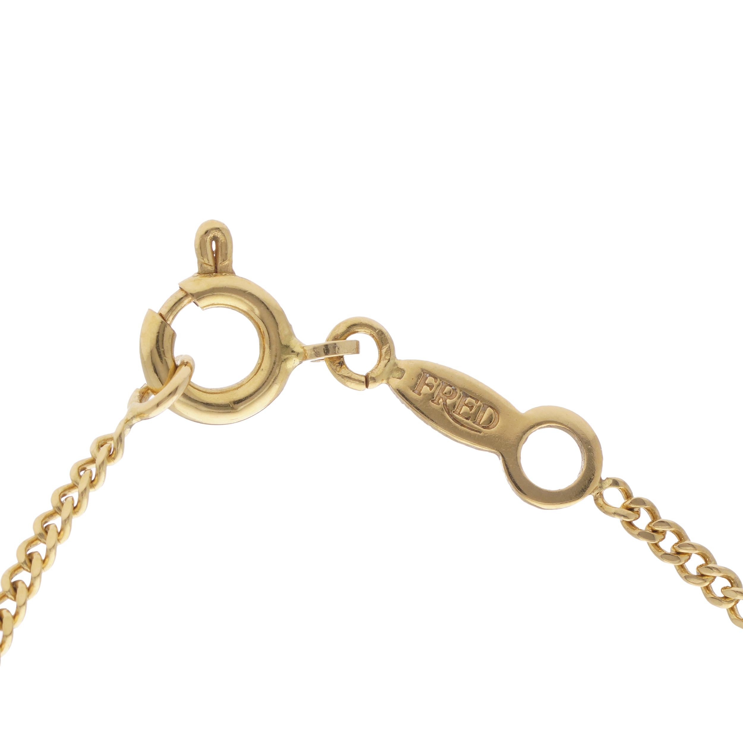 Fred Paris 18kt. yellow gold chain necklace with kitty holding ruby pendant 5