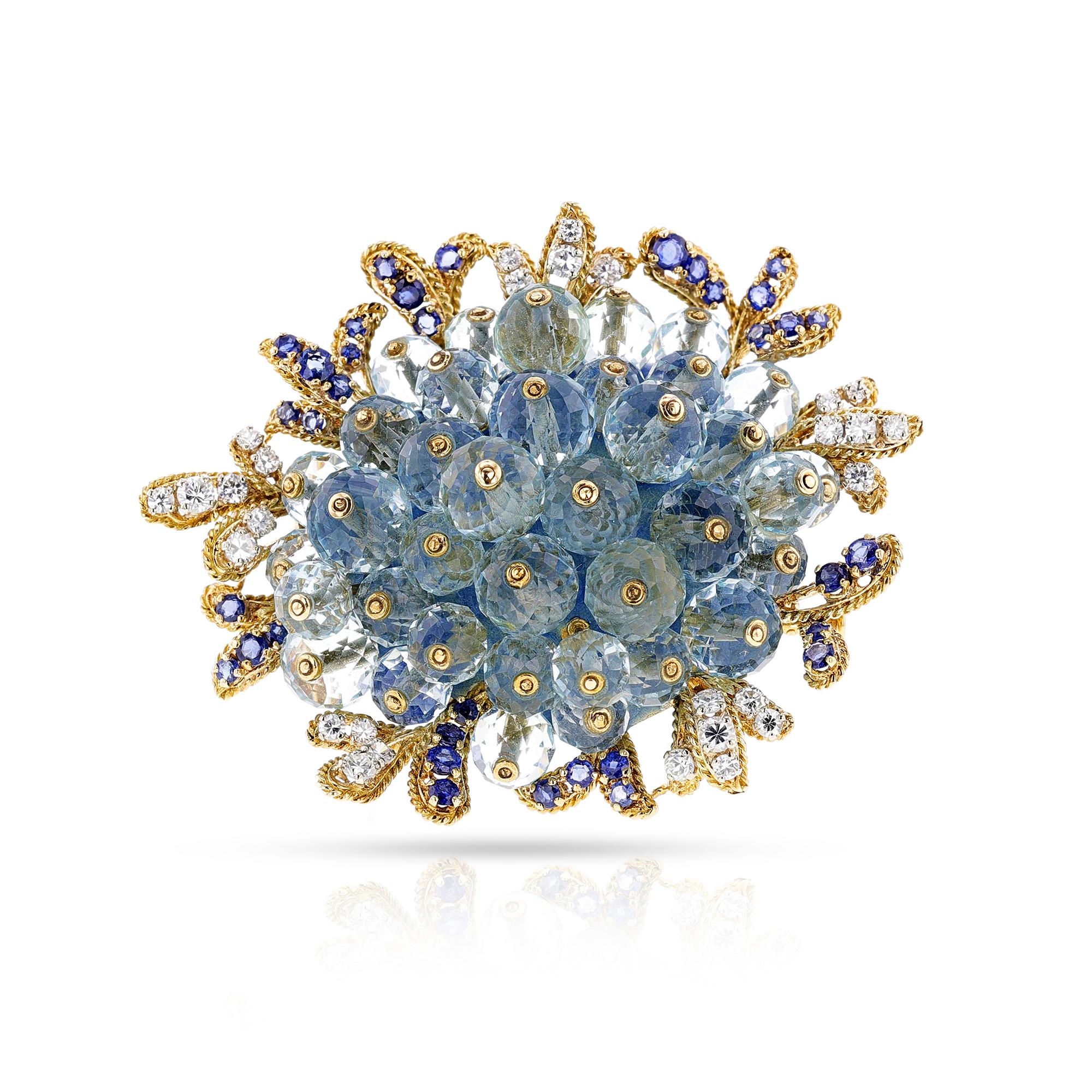 A Fred Paris Aquamarine, Sapphire and Diamond Brooch made in 18k Yellow Gold. The total weight of the brooch is 47 grams. 

SKU 1225- CRCJTJY

