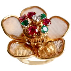 Fred Paris Articulated Flower Ring with Pistil with Rubies Emeralds and Diamond