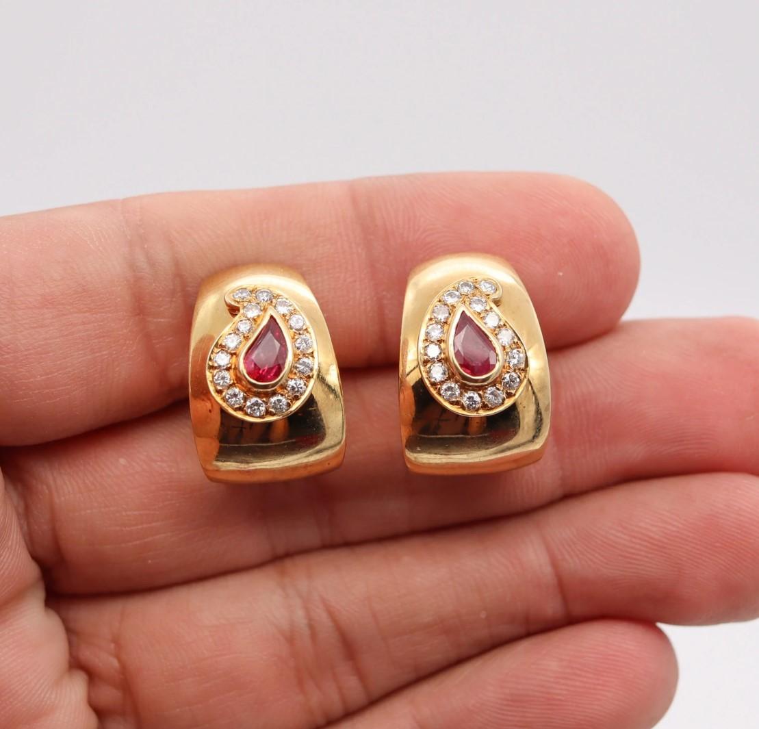 Clips earrings designed by Fred of Paris.

Beautiful pair of earrings created in Paris France by the house of Fred of Paris. These gem set pieces has been crafted in solid yellow gold of 18 karats, with high polished finish. Suited with French omega