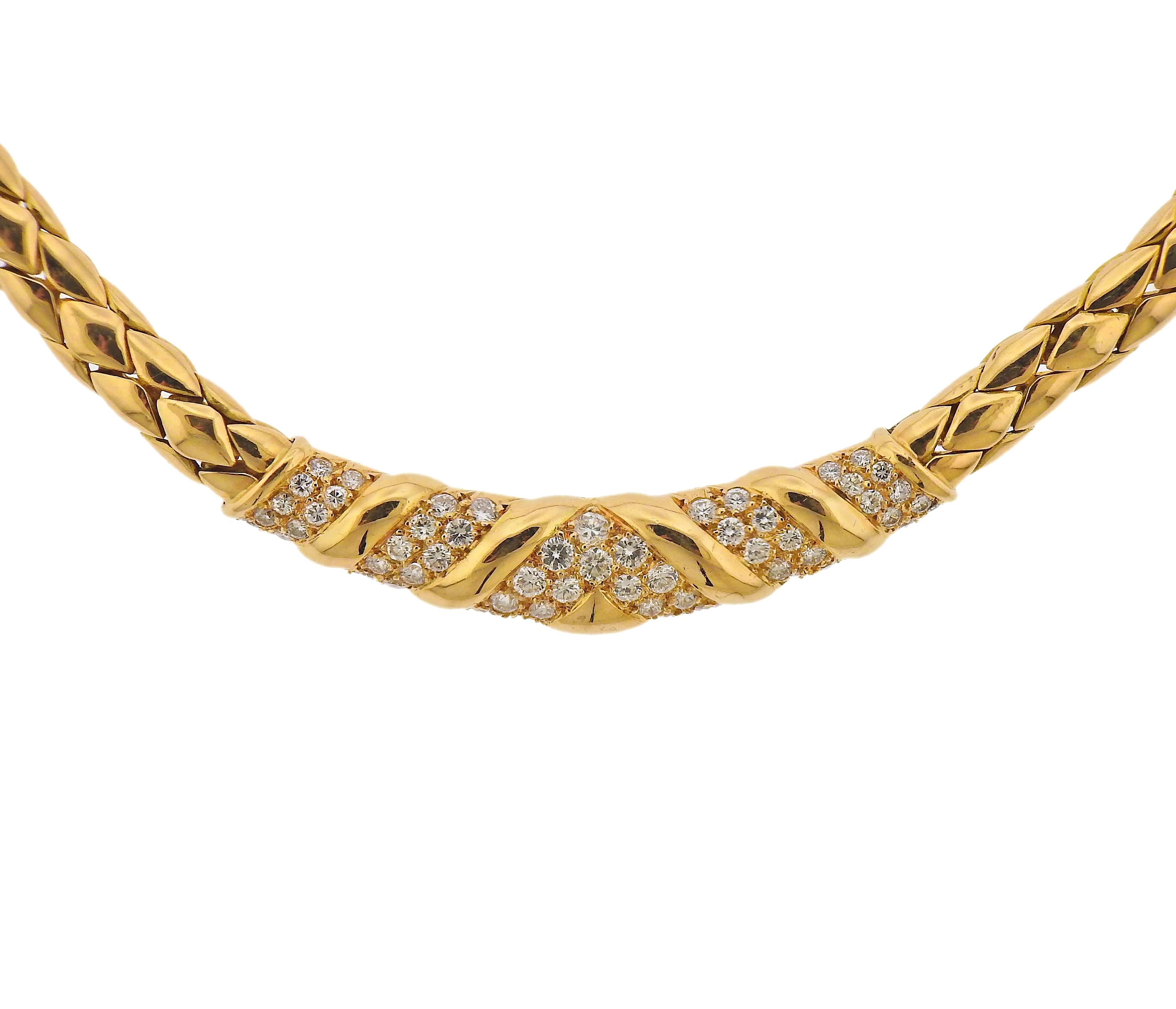 18k yellow gold necklace, decorated with approx. 1.60ctw in diamonds. Crafted by Fred Paris, necklace is 15.25