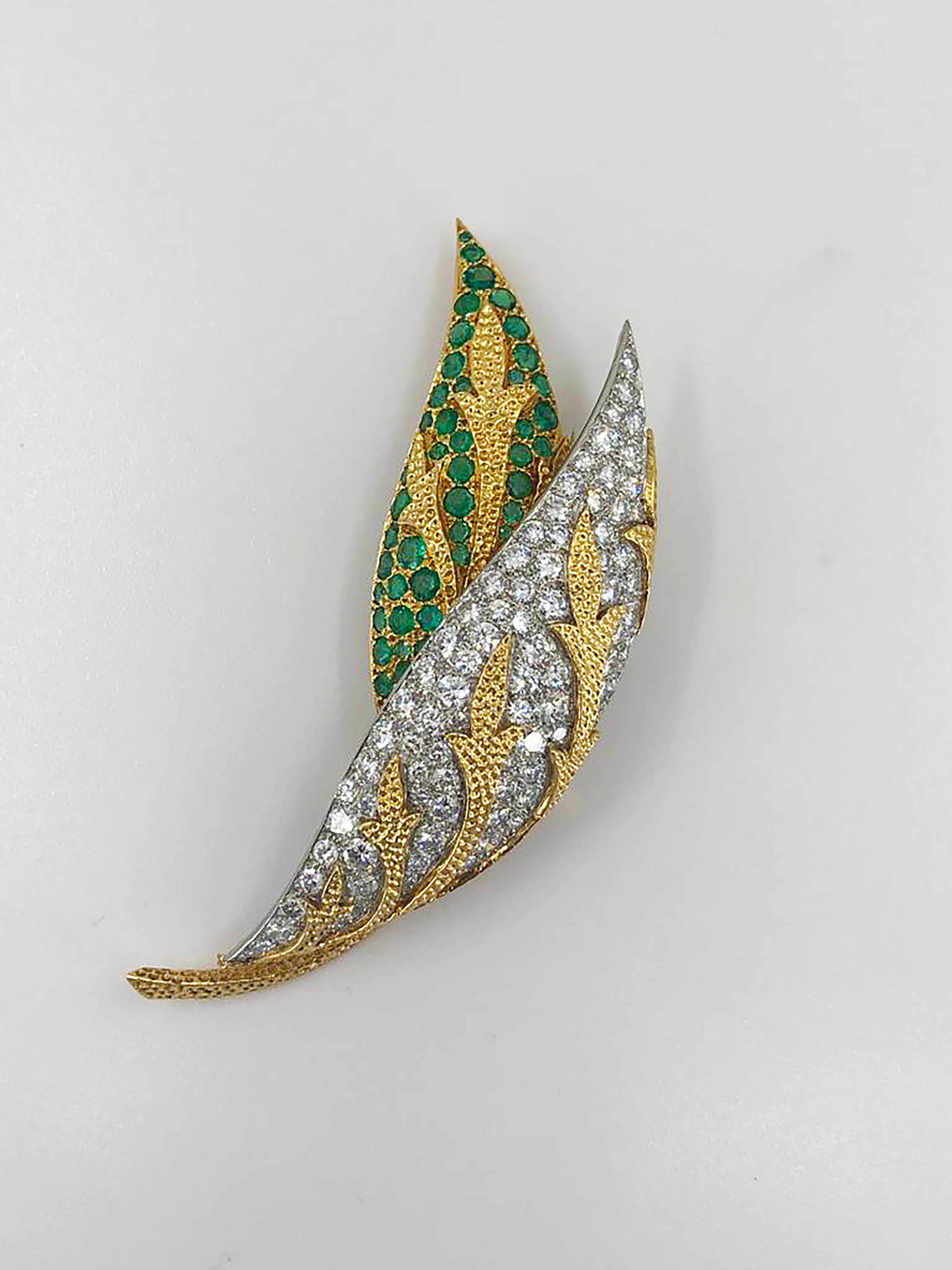 Fred Paris 18k two tone diamond and emerald lead brooch.

Approx. 3