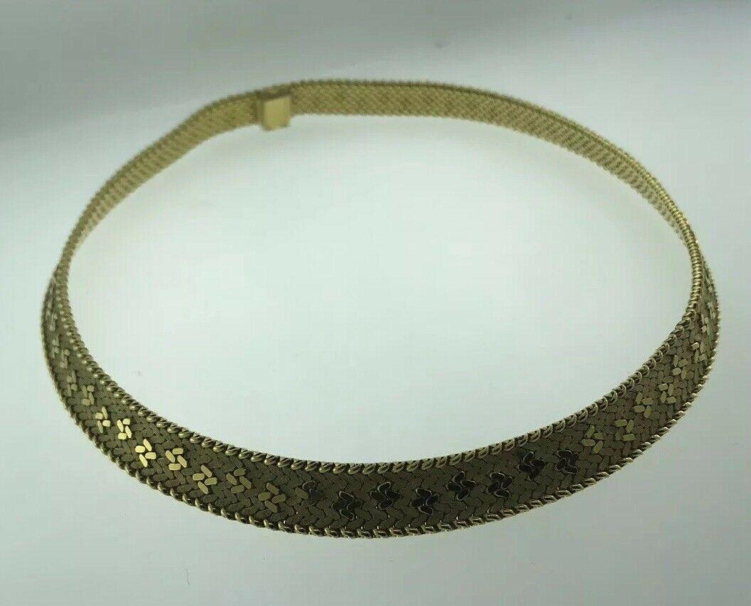 Here is your chance to purchase a beautiful and highly collectible designer necklace. Truly a great piece at a great price! 

Weight: 83.4 grams 

Dimensions: 15” (length) 3/8” (width)

Condition: Great

Signature: Fred Paris / lenfant mark / French