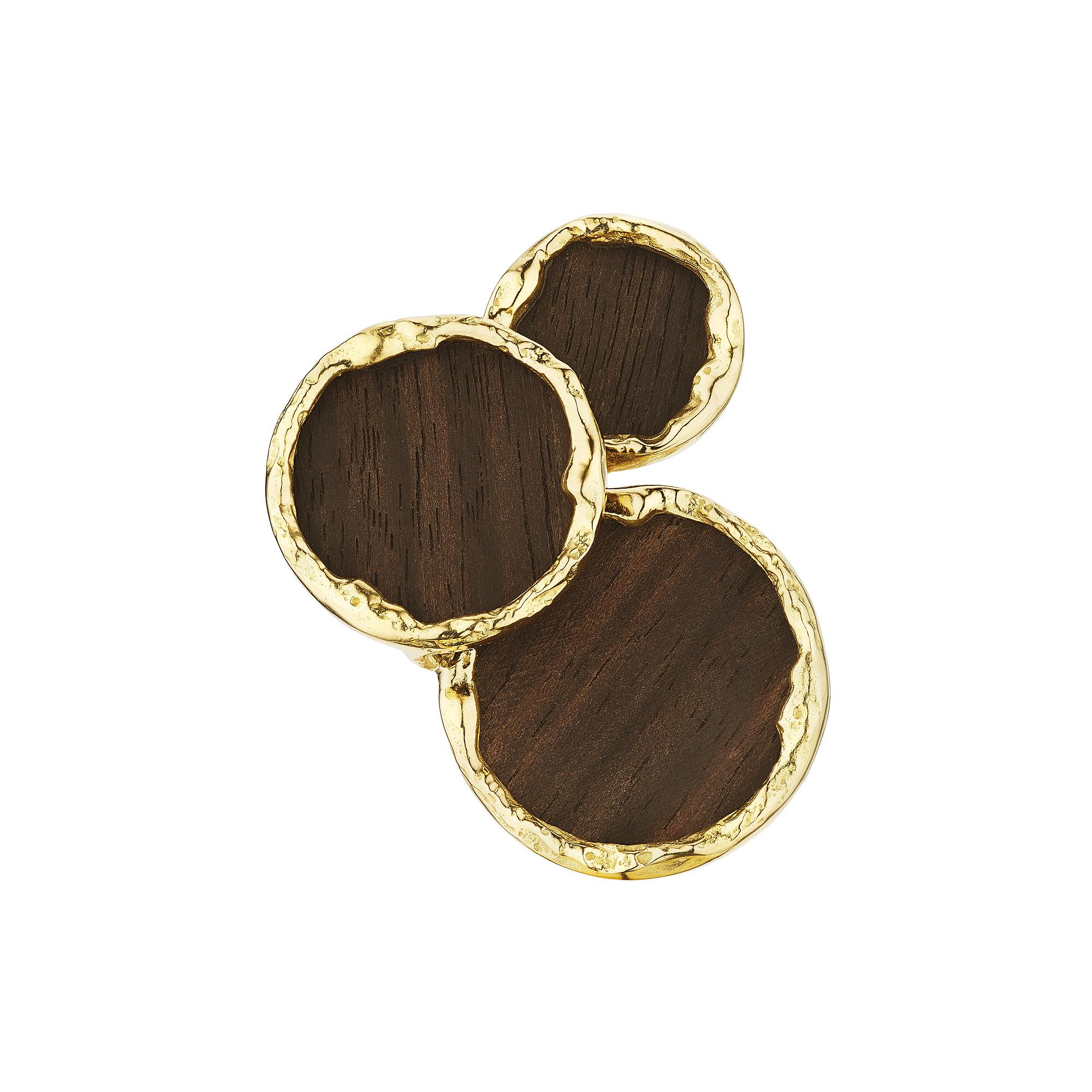 Ralph Waldo Emerson said that circles, like the soul, are never ending, and this Fred Paris mondernist rosewood and gold ring will become your timeless treasure.  With three overlapping rosewood circles rimmed in a free-form gold frame, this highly