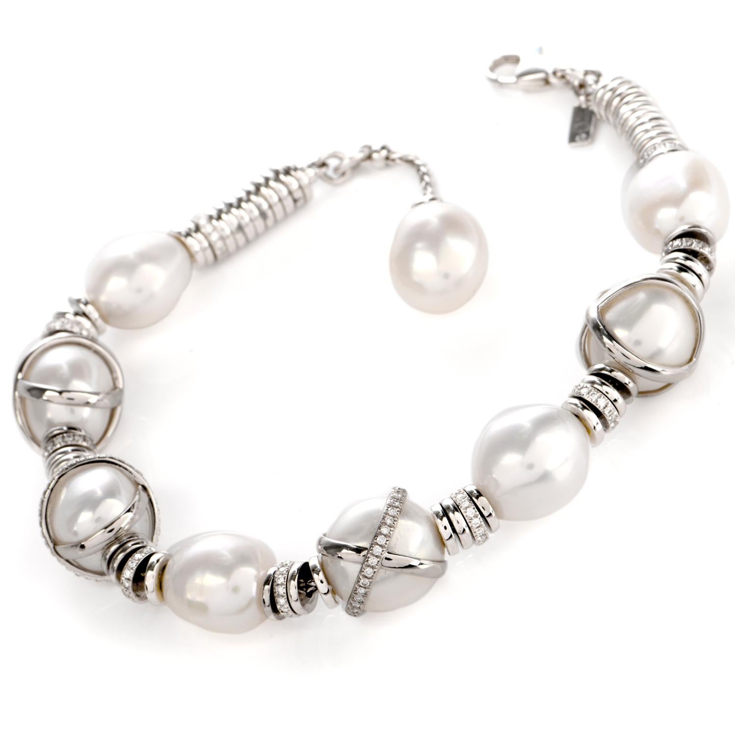 This stunning pearl and diamond bracelet is crafted in solid platinum, weighing 60.8 grams and measuring 7 inches around the wrist. Featuring 9 lustorous genuine pearls, measuring 11mm in diamter, of white silver tone. Composed of platinum disk