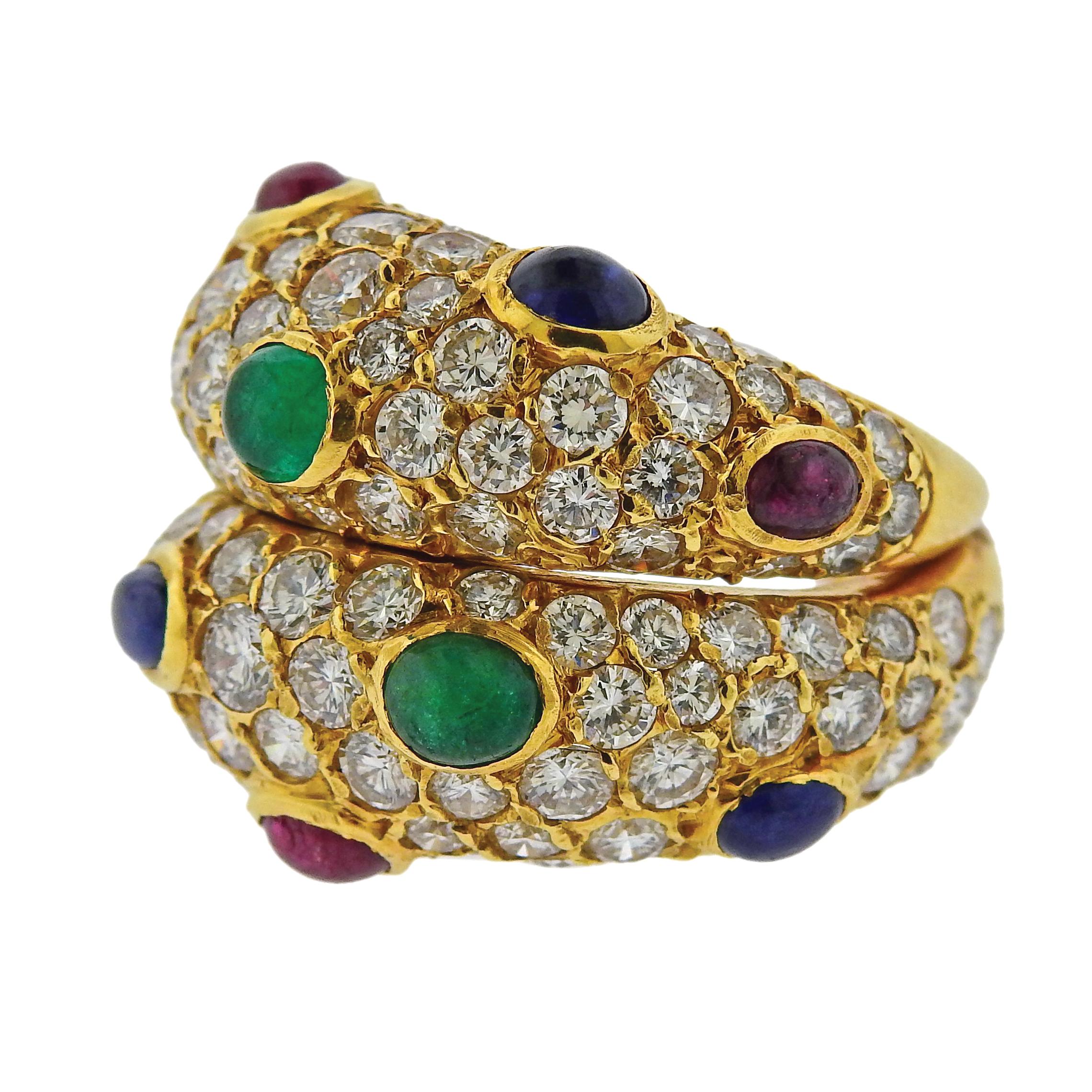 18k gold dome ring, crafted by Fred Paris, set with sapphire, emeralds and ruby cabochons, surrounded with approx. 4.00ctw in diamonds. Ring size - 4.25, ring top is 19mm wide. Marked Fred Paris, French marks. Weighs 14.6 grams.

SKU#R-03064