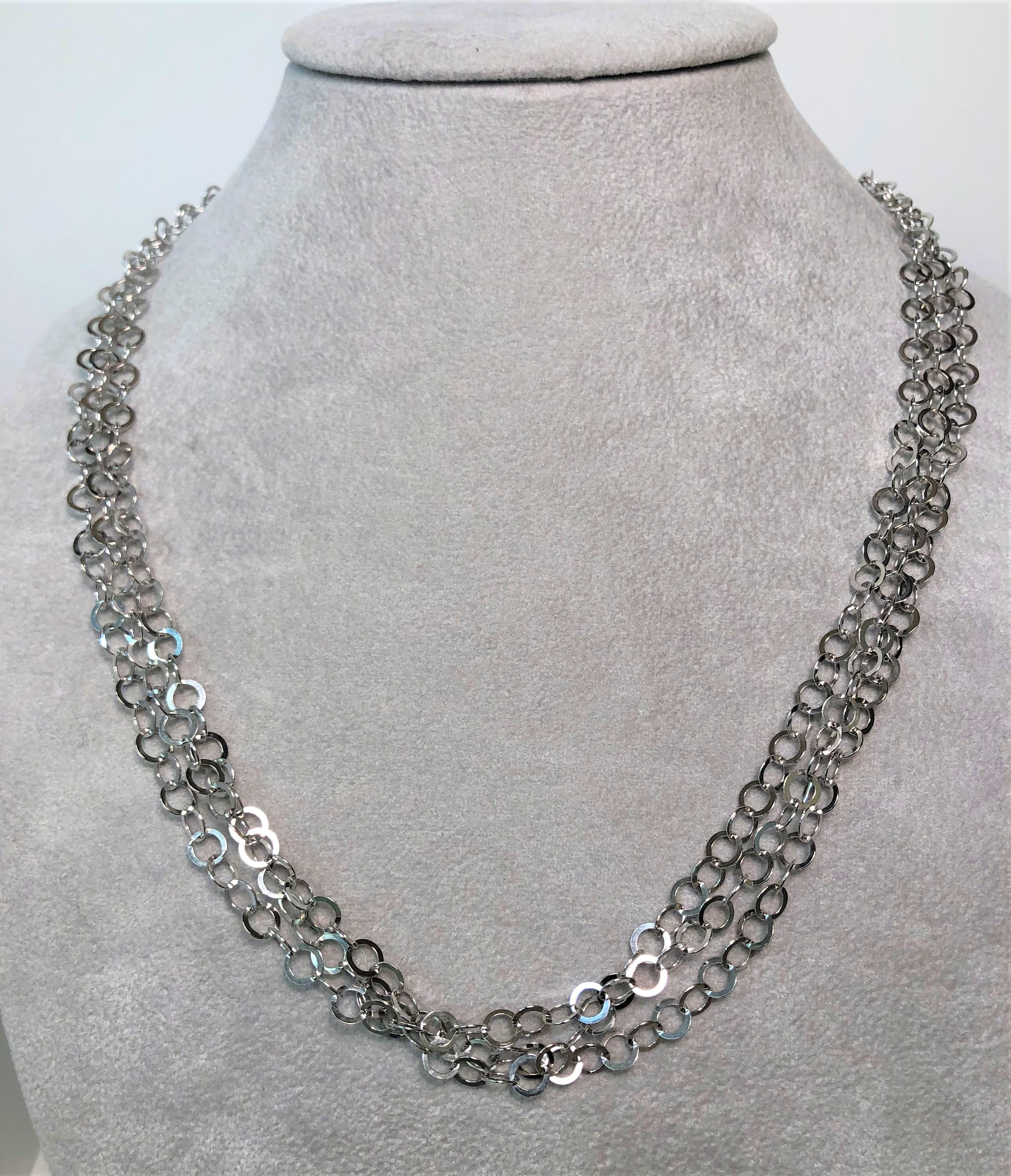 True to Frederic Duclos high quality sterling silver style, this triple strand light weight shiny necklace is a must have!
Wear dressed down or for a dressy event!  
Sterling silver three strand circle link necklace.
Lobster clasp.
Stamped 