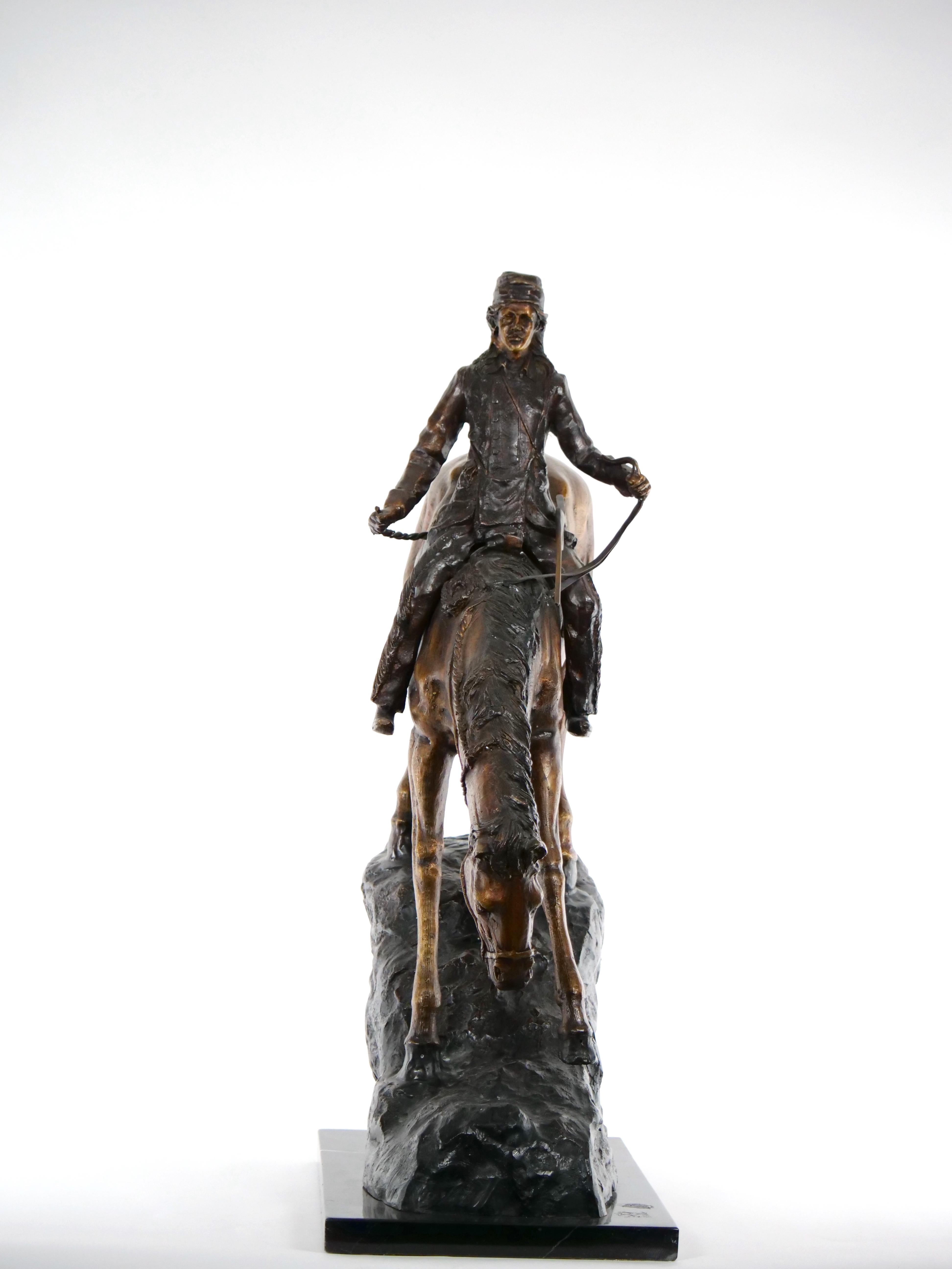 Heavy bronze and black rectangle marble base Frederic Remington 29 inches high bronze sculpture statue of the mountain man Native American Indian bronze Horse and black marble base. The sculpture features a large rectangle shape marble base, large