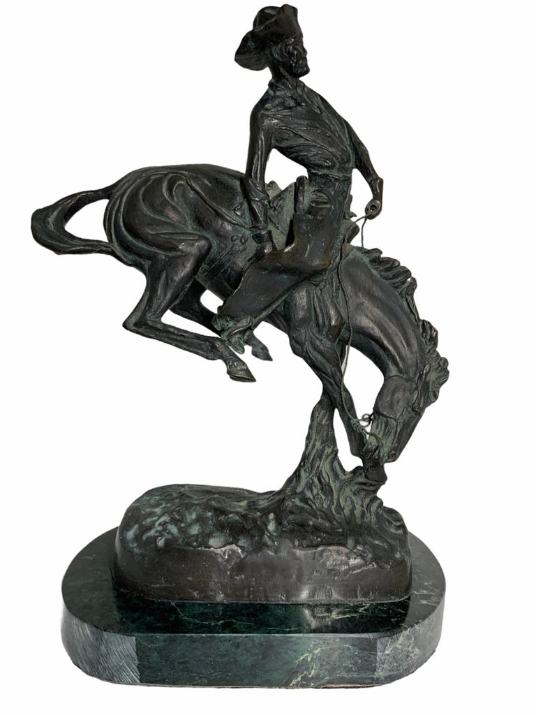 Frederic Remington Patinated Bronze Sculpture “The Outlaw” at 1stDibs
