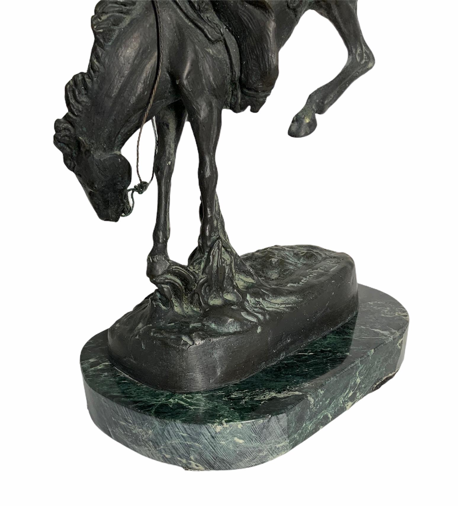 20th Century Frederic Remington Patinated Bronze Sculpture “The Outlaw”