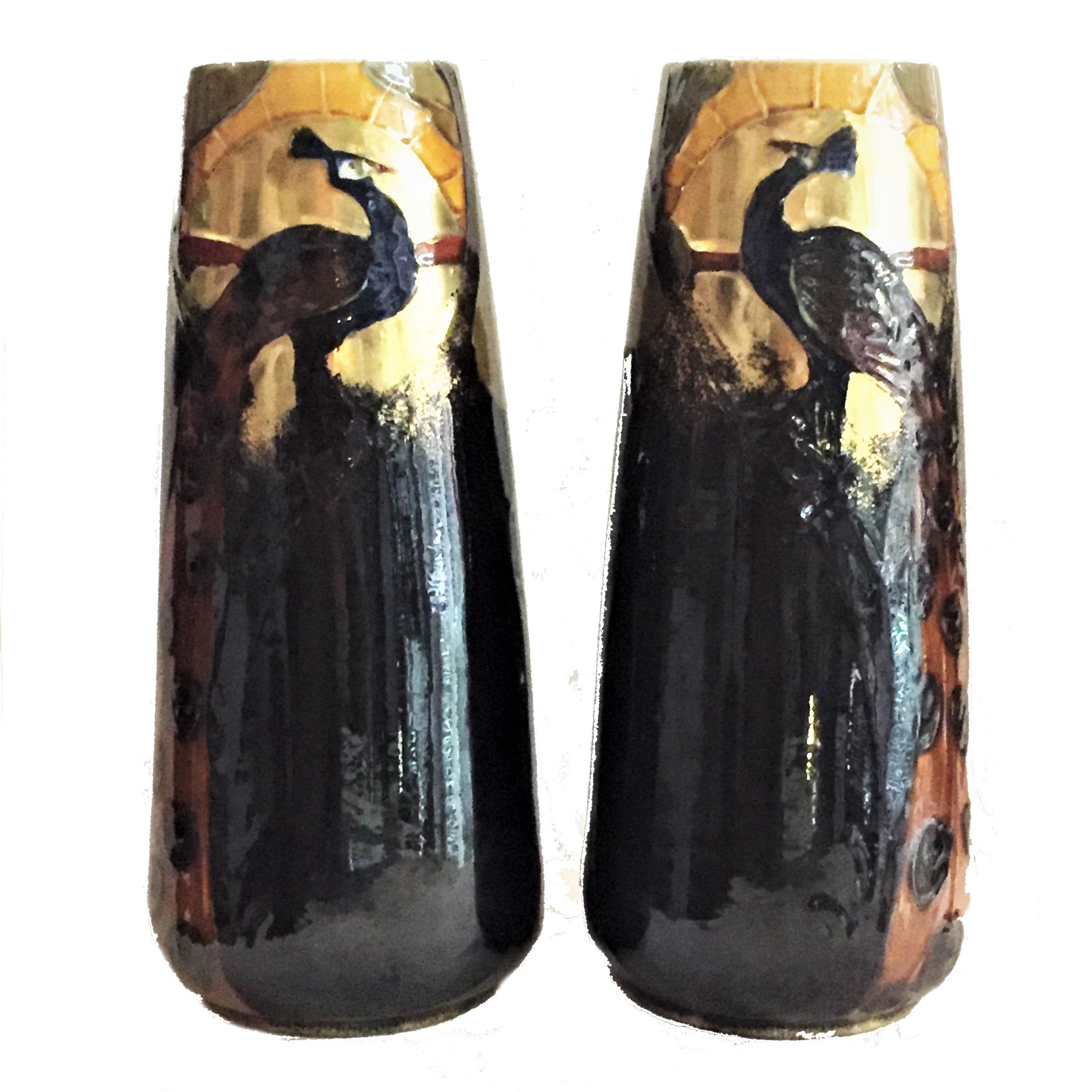 Frederic Rhead, a pair of English Arts & Crafts Glazed terracotta vases with Peacocks, circa 1900.

This outstanding pair of English Arts & Crafts glazed terracotta vases with peacocks was designed by Frederic Hurten Rhead for Wileman & Co., and