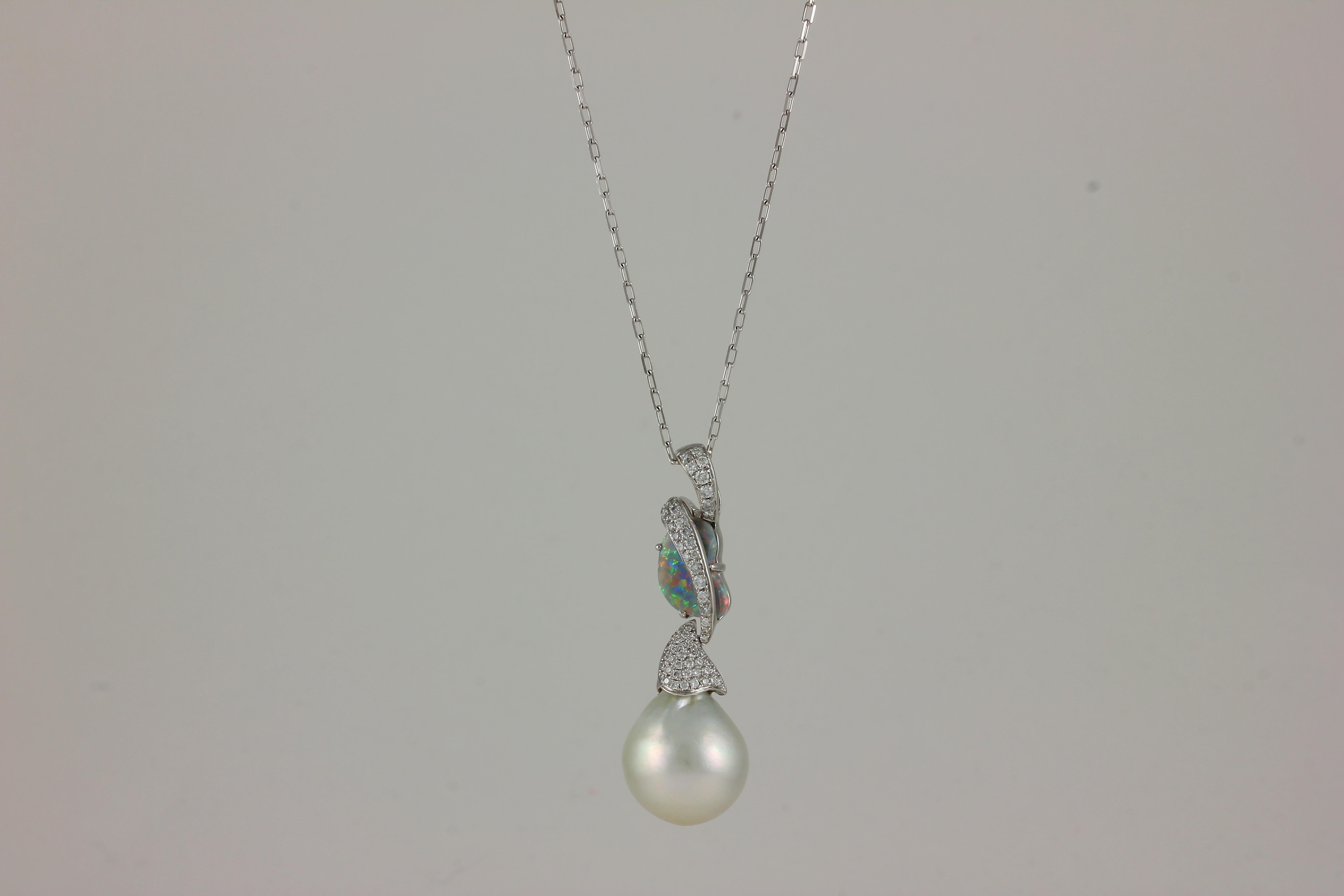 18K WG FC OPAL, PEARL AND DIAMOND ONE OF KIND WRAP PENDANT W. CHAIN
OP 1.33 Carats, 34 DIA 0.17 CARATS