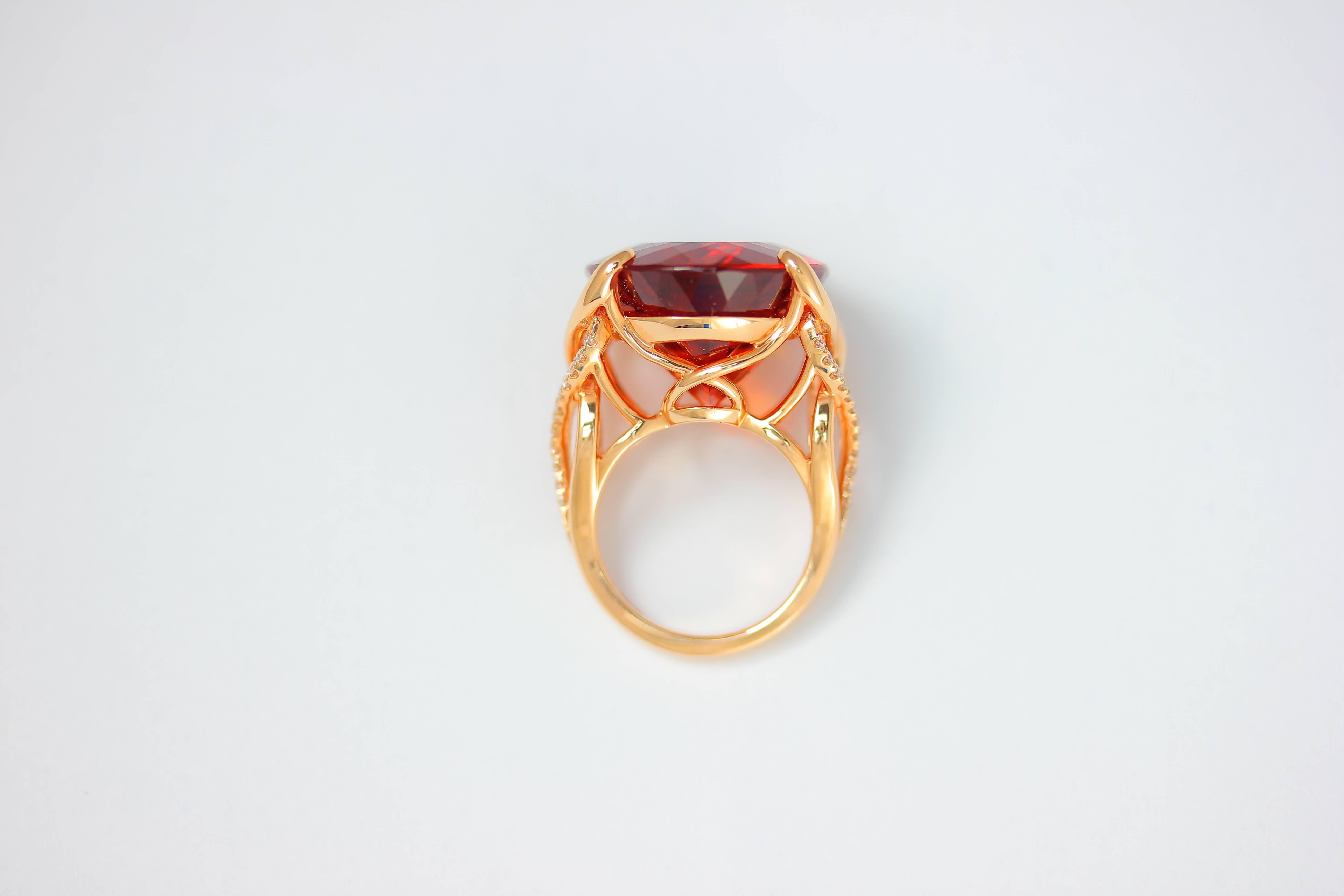 One-of-a-kind Frederic Sage oval Madeira Citrine cocktail ring with microset diamond accents set in 18 karat rose gold

Total Madeira Citrine weight: 31.30 ct
Total diamond count: 48
Total diamond weight: 0.40 ct