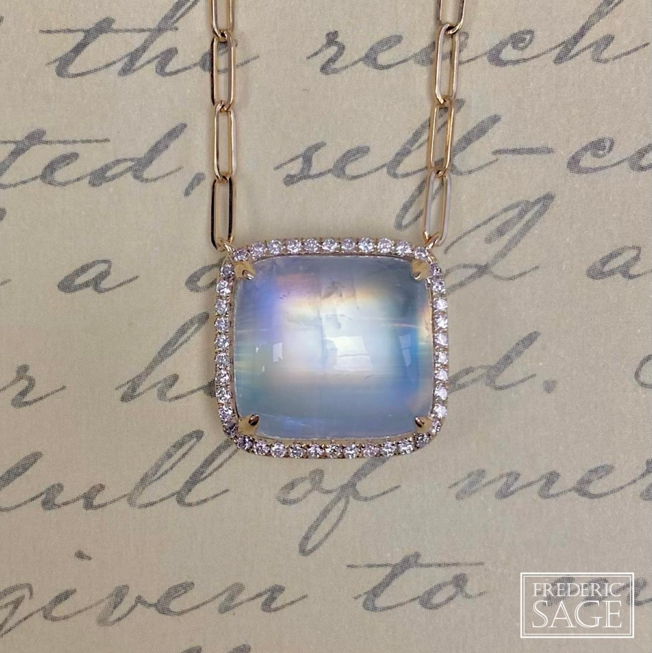 Cushion Moonstone On Diamond Halo One Of A Kind Pendant With Attached Chain, Moonstone 19.75 Ct, Diamond 0.29 Ct, (approximately 18 mm x 18 mm)

Available in other metal/ gemstone options: These Gemstone pieces can be made in white, pink, yellow