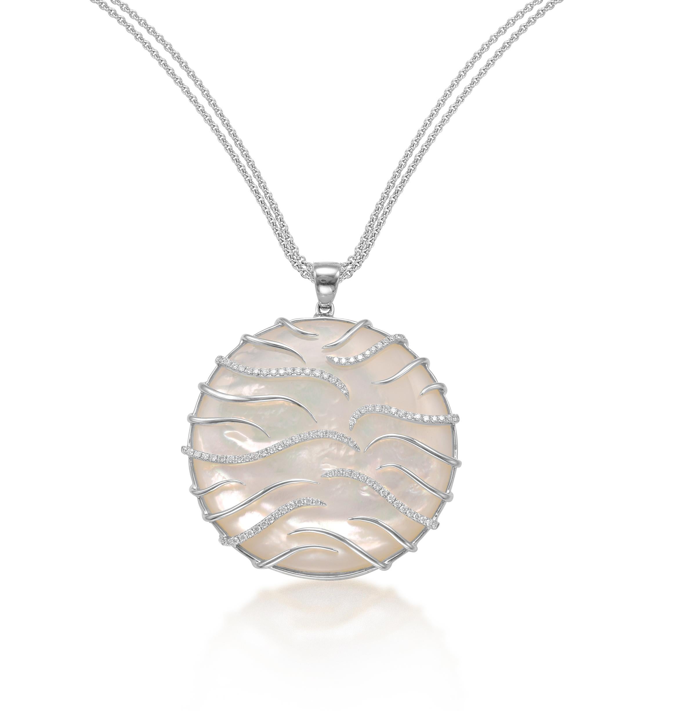 14K WG LARGE RD MOP AND DIA LUNA MEDALLION PENDANT WITH CHAIN
MOP 55.59 CT, 96 DIA 0.64 Carats