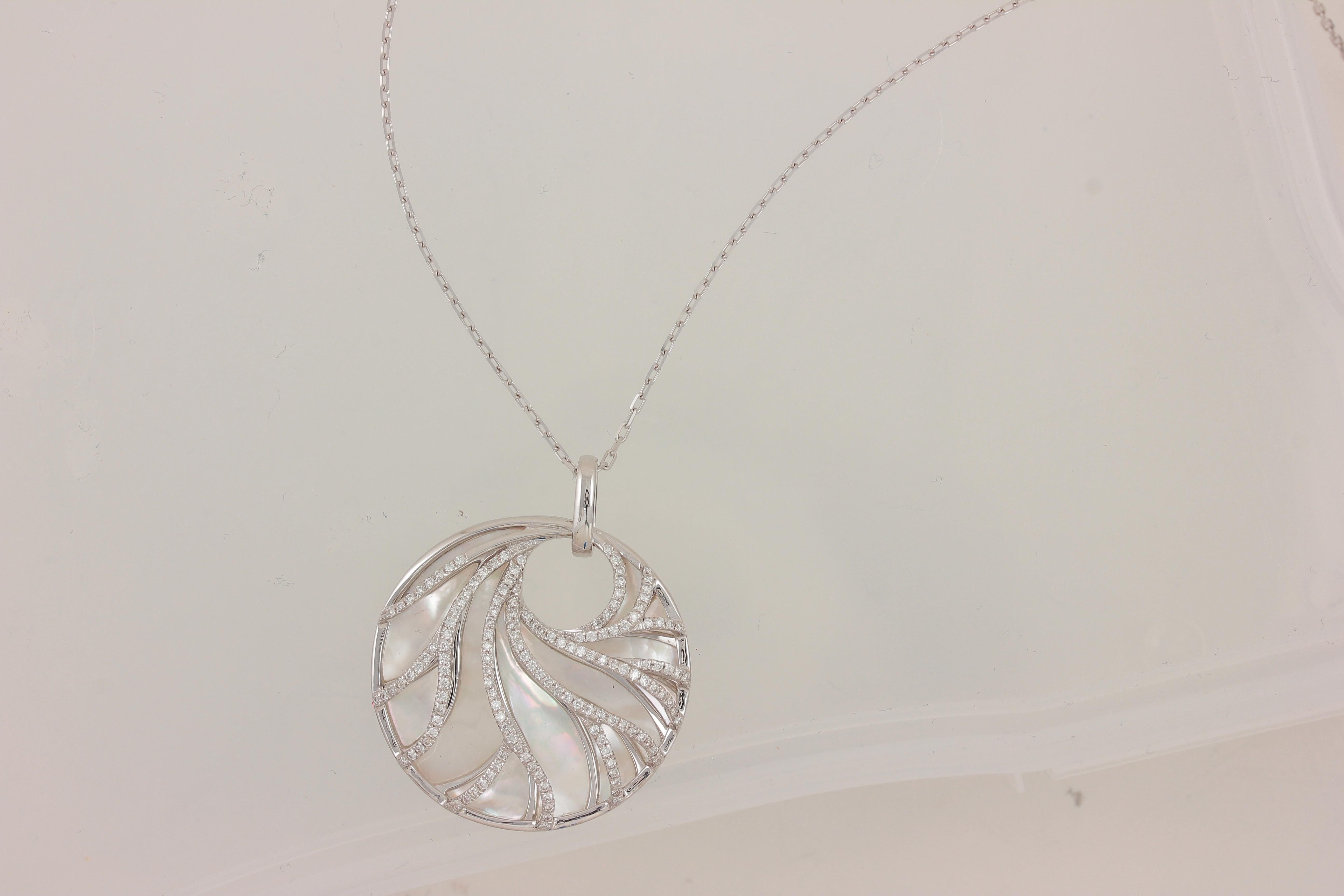 mother of pearl and diamond pendant