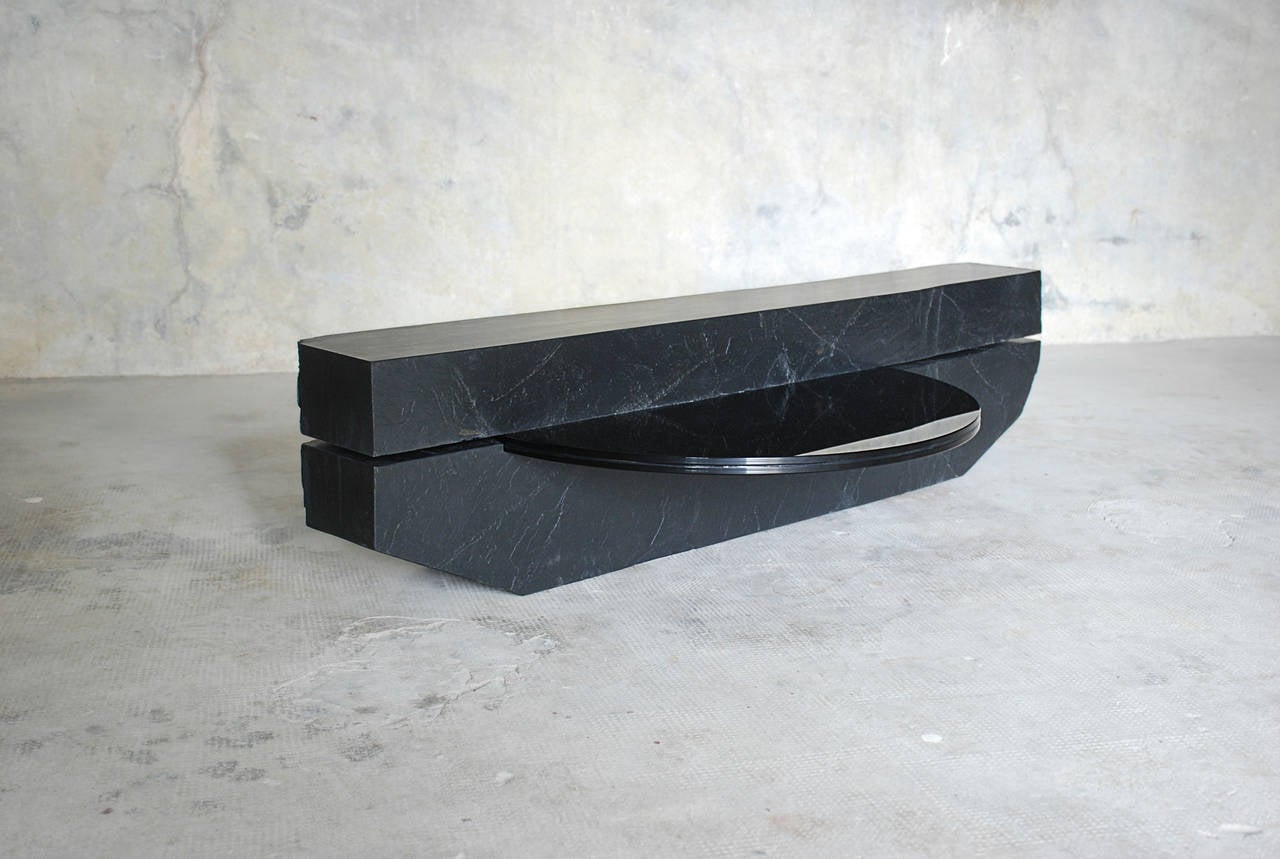 Subtitle.
Coffee table.
Fre´de´ric Saulou.
Materials: Tre´laze´ black slate, gray smoked glass.
Dimensions: 17 x 130 x 30 cm.

Edition of 8.
Signed and numbered.

“While wandering in the streets I have been observing buildings
construction