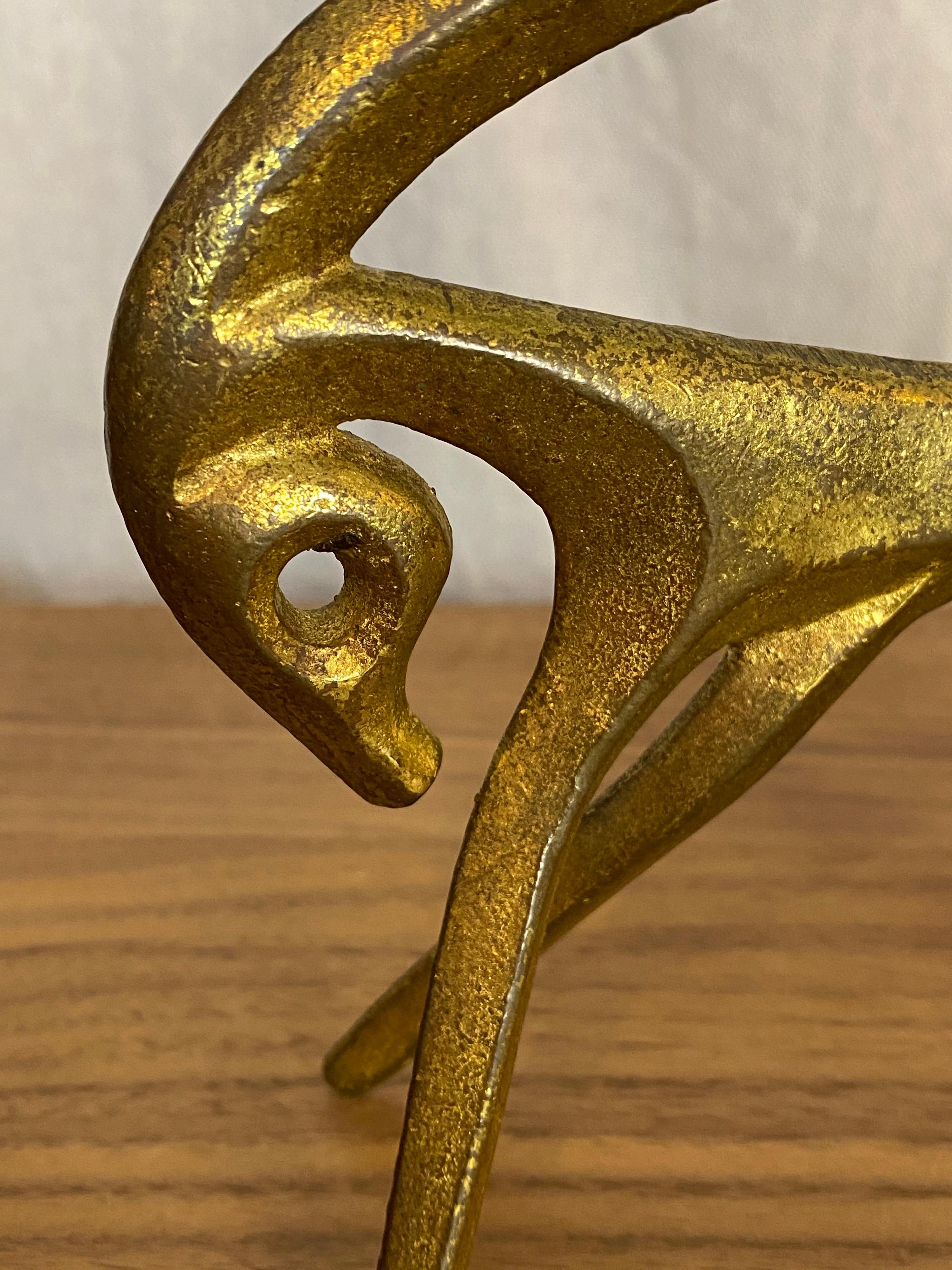 Frederic Weinberg antelope, iron animal with a brass or bronze applied surface treatment. Weinberg did an entire series of these whimsical animals. Great to collect the whole herd! Signed lower foot.