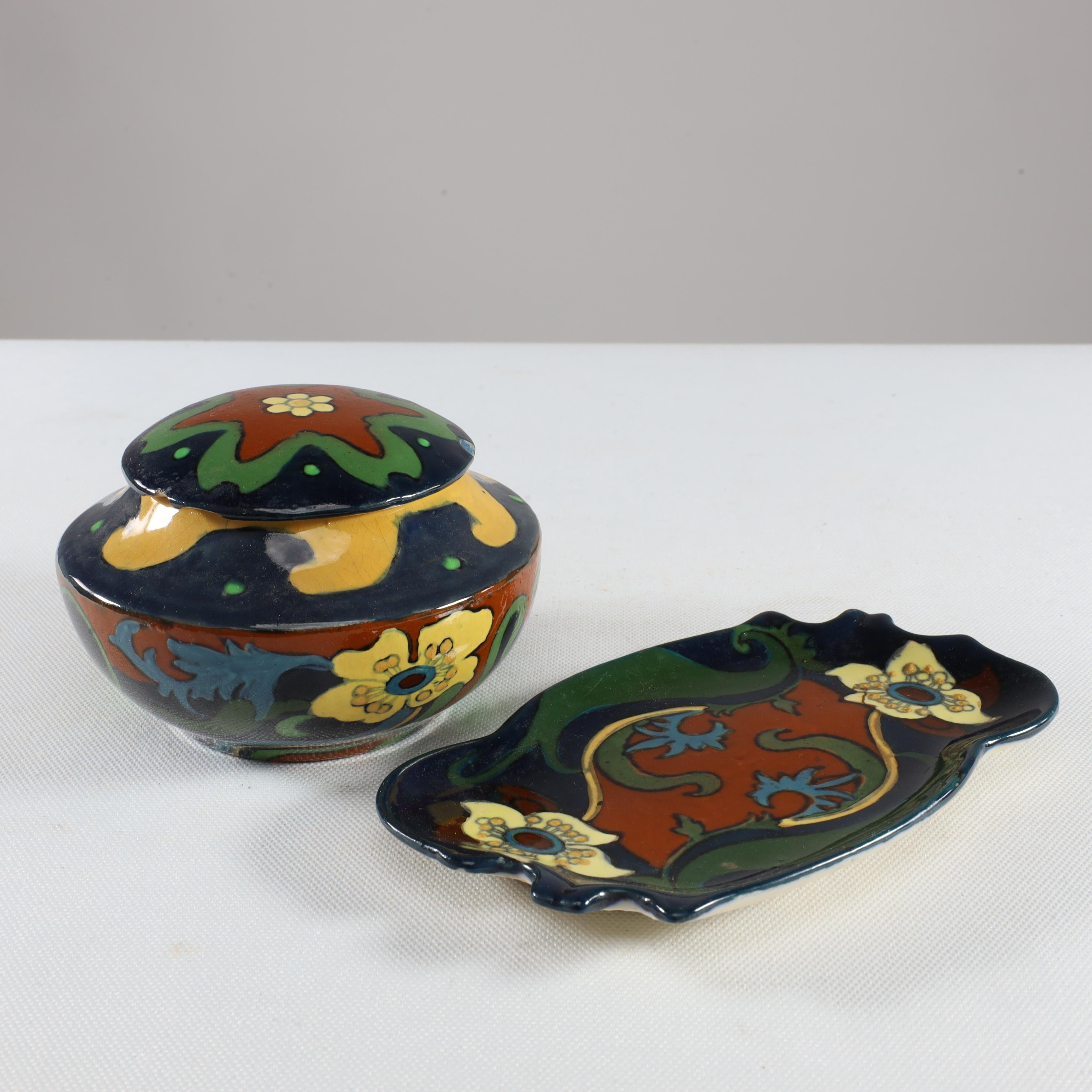 Frederick Alfred Rhead for Foley Art Pottery. Small pin tray and pot. Rhead was employed in 1896, as the Arts Director. Rhead was already an important designer and introduced the Intarsio range to the company. In 1899 the journal 'Artist' wrote an